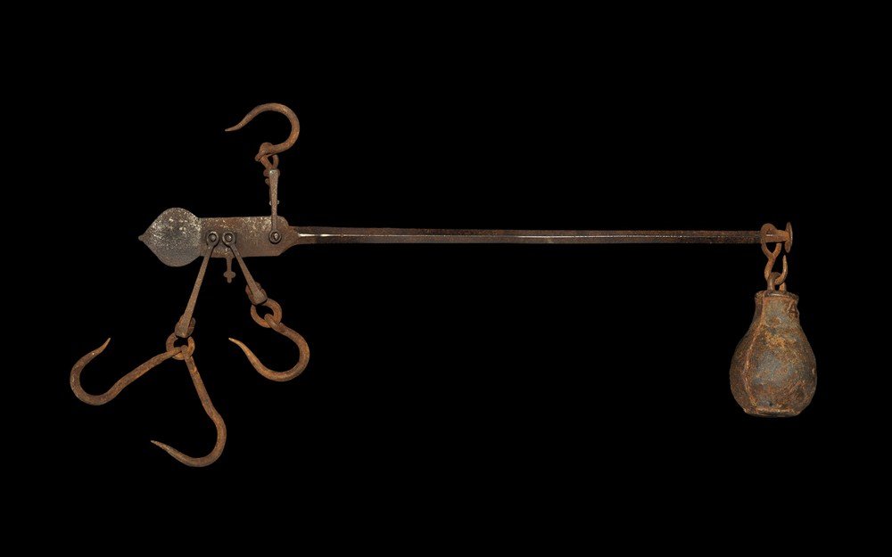 Post Medieval Iron Steelyard Balance: 18th-19th century AD . A steelyard balance with articulated hook and trefoil pointer, two articulated suspension hooks and one slider for attachment of the weight; the yard with graduated readings eng