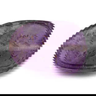 Phoenician Amethyst Scarab: 8th century B.C. Plano-convex in section with carved carapace to upper face; two lines of Phoenician script to underside. 3.21 grams, 18 mm (3/4 in.). (For this specific lot, 5% import VAT is applicab