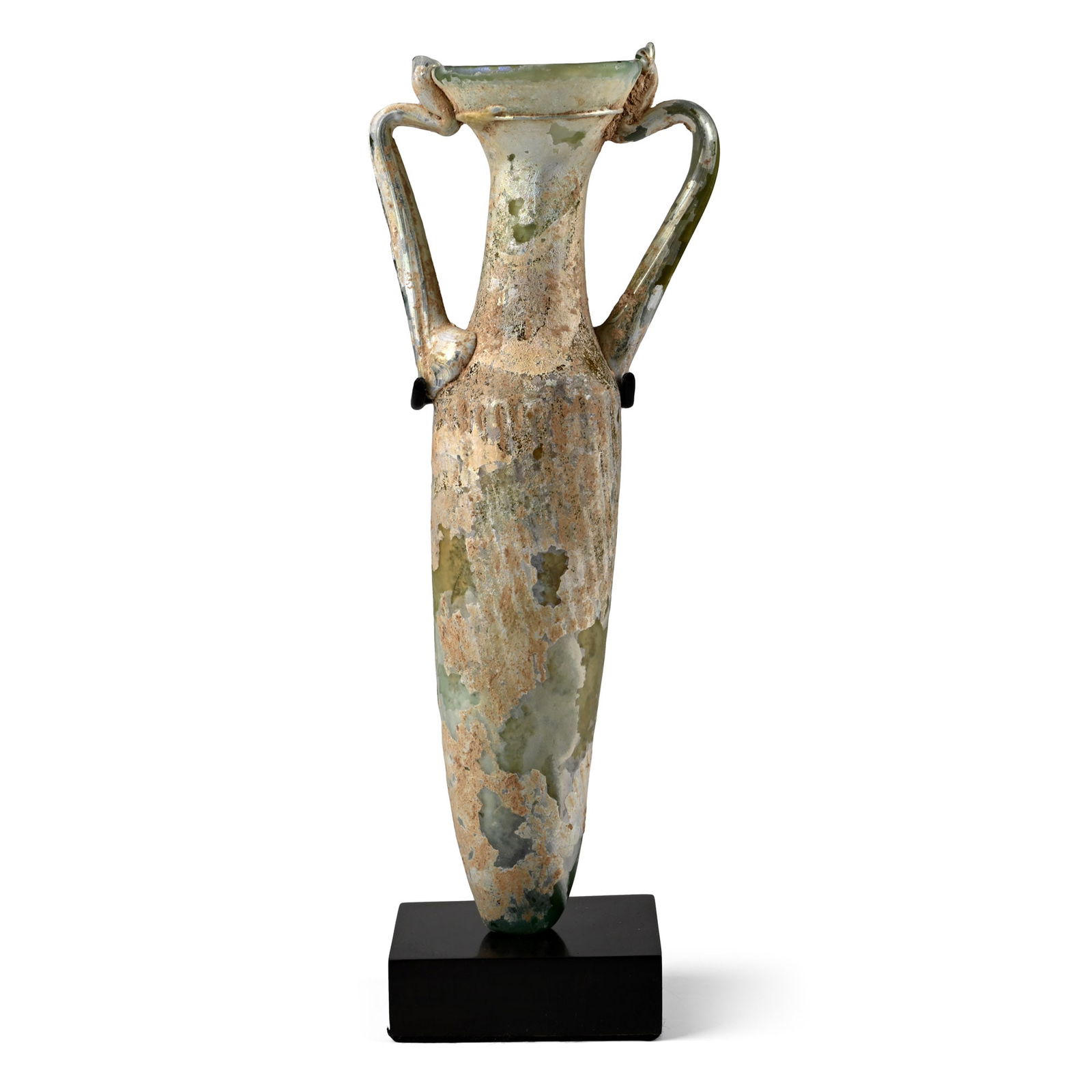 Roman Fine Glass Amphora: 1st-3rd century A.D. Aqua glass with sloping rounded shoulder, tubular body tapering to a rounded base, cylindrical neck and everted rim, applied scrolling handles; iridescent surfaces; mounted on a c