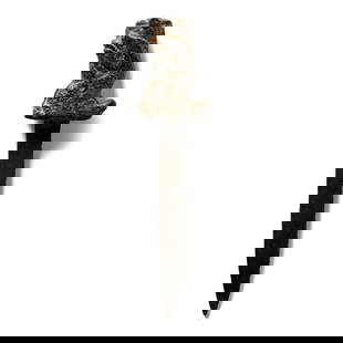 Roman Style Bronze Model Knife: 18th century A.D. or later With narrow tongue-shaped iron blade and copper-alloy hilt formed as a hippocamp. 10.7 grams, 87 mm (3 3/8 in.). From the collection of a gentleman, acquired on the London a