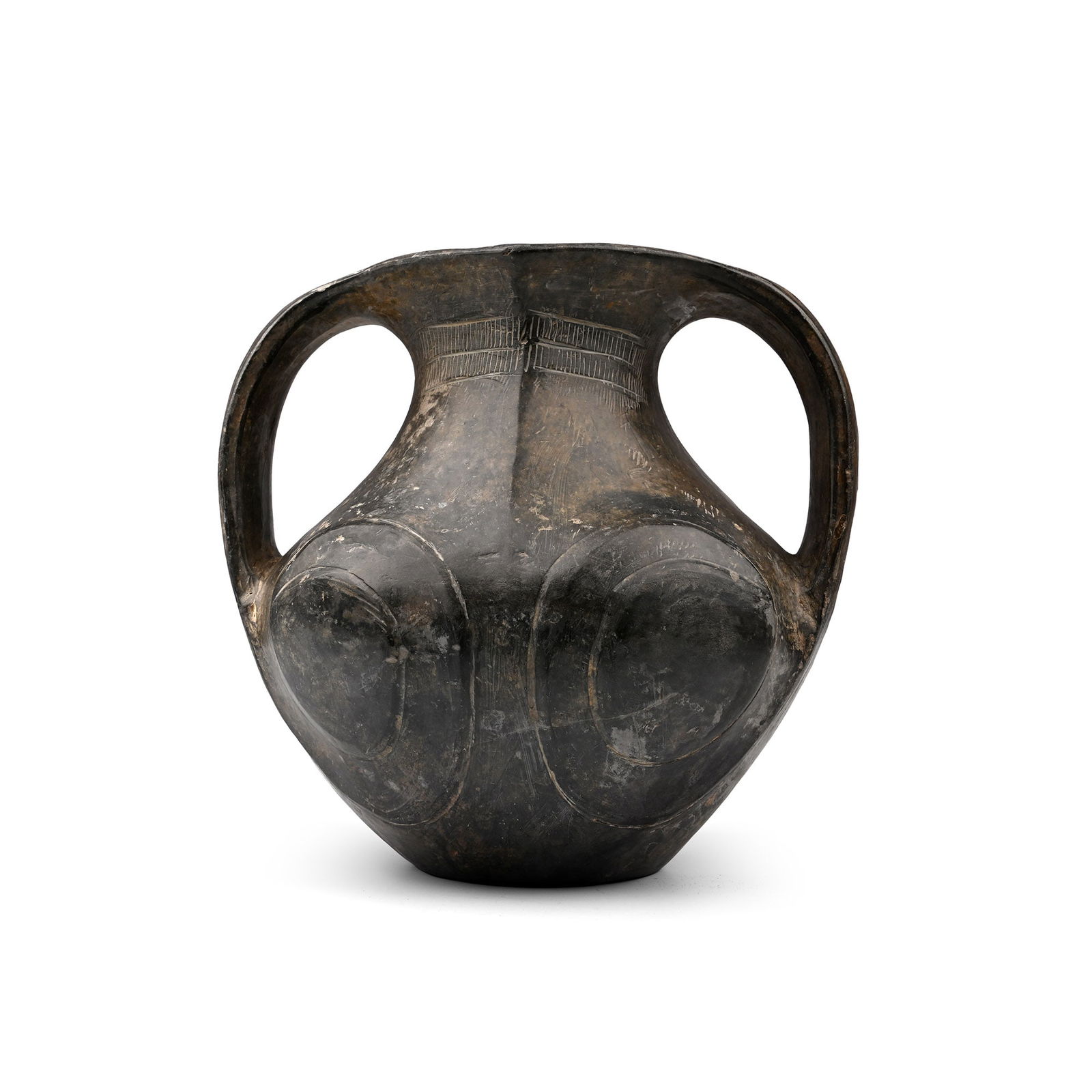 Chinese Han Sichuan Black Eye Pottery Amphora: Han Dynasty, 206 B.C.-220 A.D. Burnished black ware jar with scooped and carinated profile to the neck, two broad strap handles with roundel detailing, hatched panels to the neck, spiral 'eye' panels