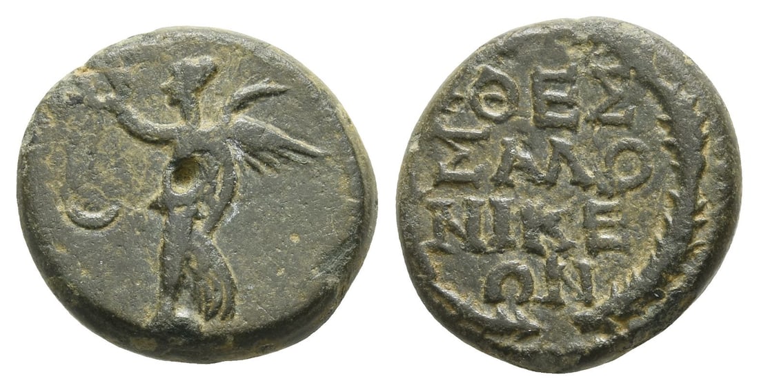 Macedon, Thessalonika AE 16mm.: Macedon, Thessalonika AE 16mm. Time of the Flavians(?), circa AD 69-96. Pseudo-autonomous issue. Nike standing on globe to left; crescent in left field / ??CCA???????? in four lines within laurel wrea