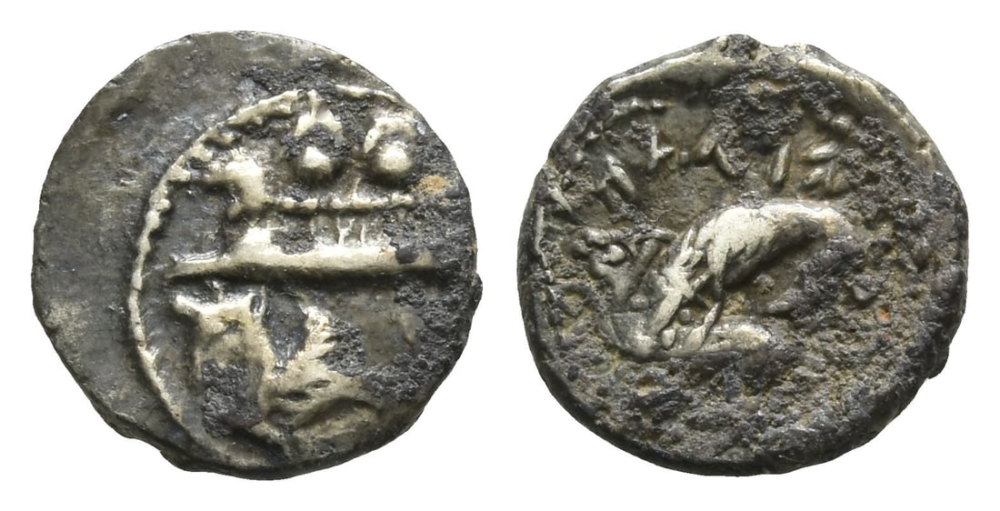 Phoenicia. Byblos, 'Aynel (Enylos) AR 1/16 Shekel.: Phoenicia. Byblos, 'Aynel (Enylos) AR 1/16 Shekel. Circa 350-326 BC. Galley to left, containing two hoplites with helmets and round shields; hippocamp to left below / Lion attacking bull to left; lege