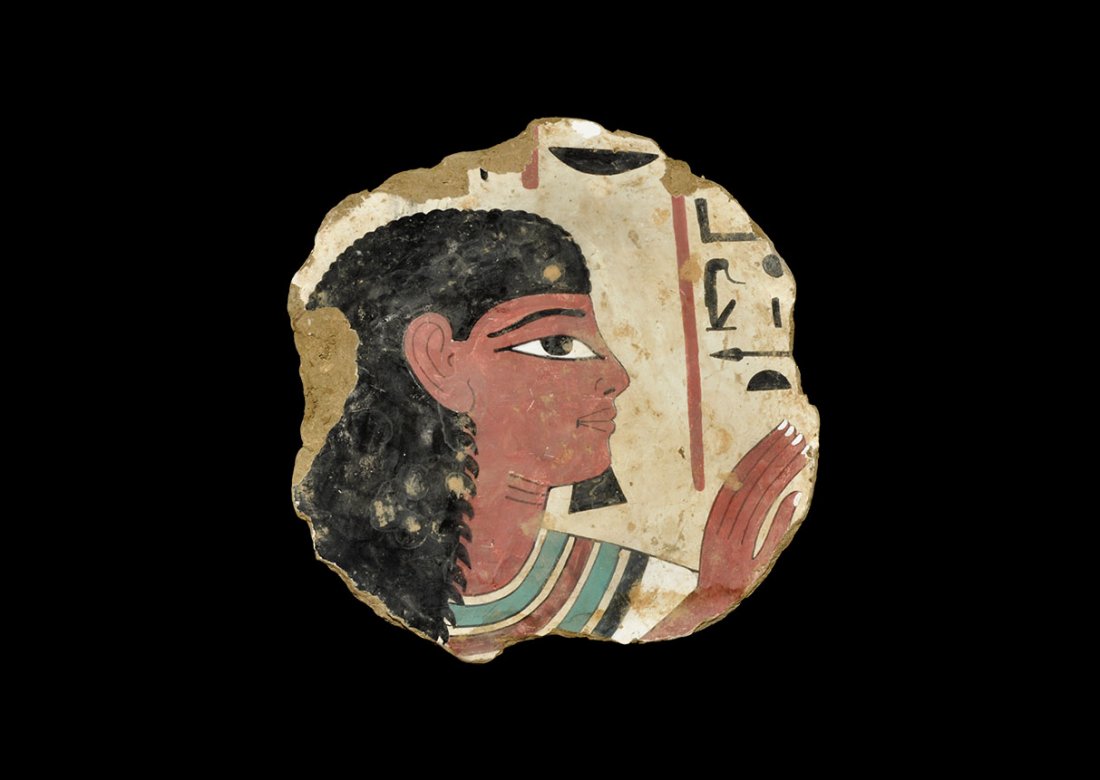 Egyptian Style Painted Wall Plaster Panel: An undated archaistic painted wall plaster fragment depicting a profile head with false beard, hieroglyphs in front. Acquired on the London art market in the 1960s. 702 grams, 26 cm (10 1/4"). [No Res
