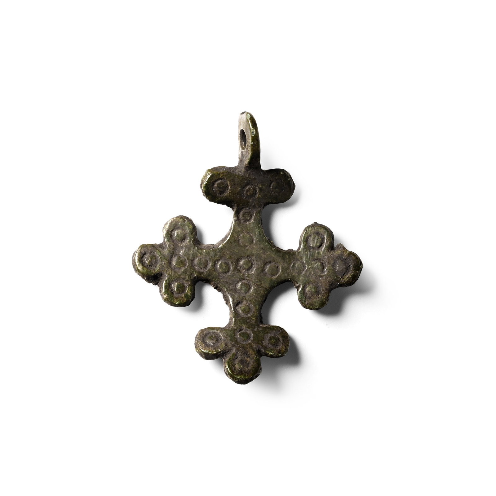 Byzantine Bronze Reliquary Cross Pendant: Circa 9th-12th century A.D. Cross pommee type, bifacial with punched rings to the lobes and central lozenge; some distortion. 4.96 grams, 35 mm (1 3/8 in.). [No Reserve] Ex Den of Antiquity, Cambridge