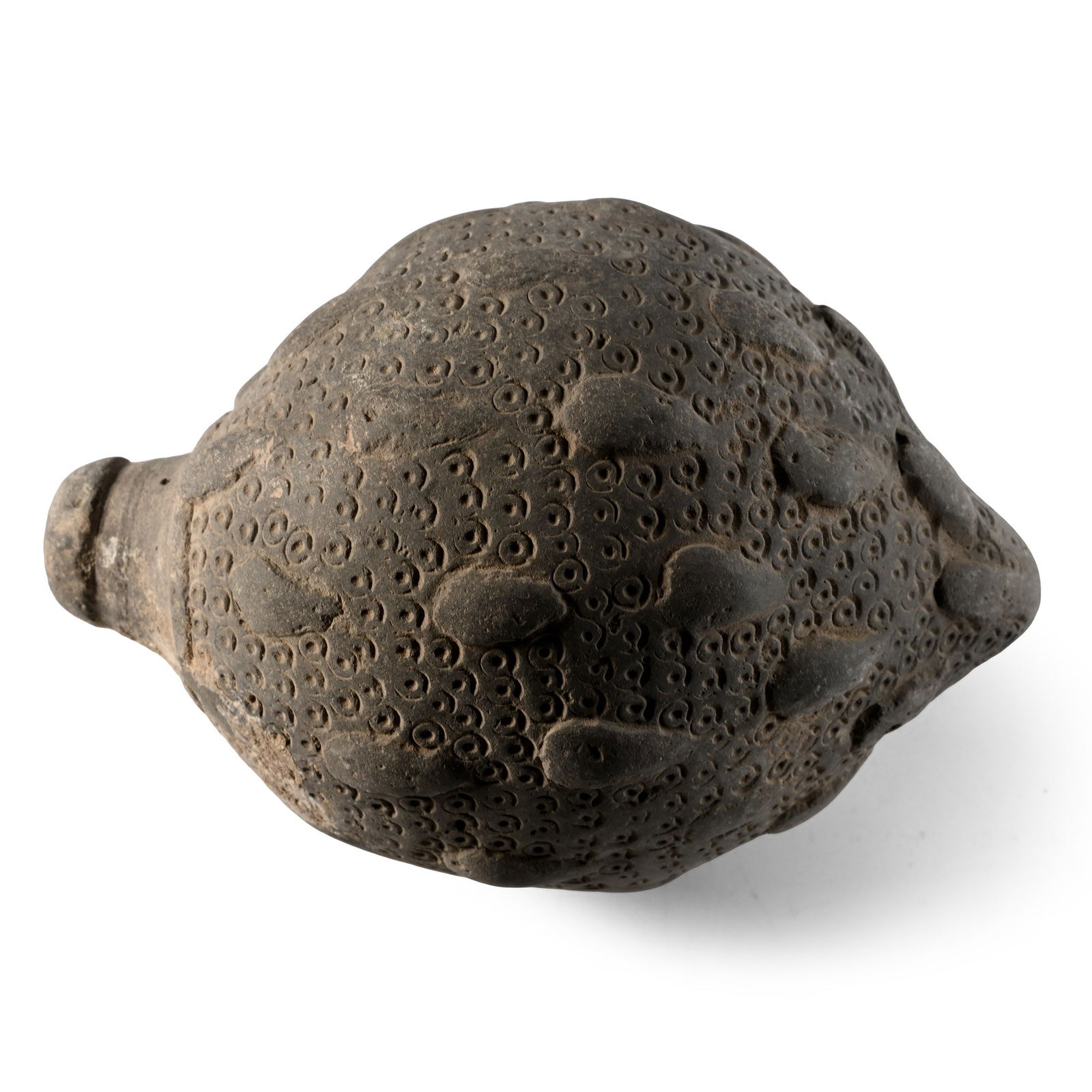 Byzantine 'Greek Fire' Ceramic Fire Bomb or Hand Grenade: 9th-11th century A.D. Piriform in profile with domed mouth; raised lugs to the body with impressed texture in between; intended to be filled with explosive liquid and a wick, and used as a hand grenad