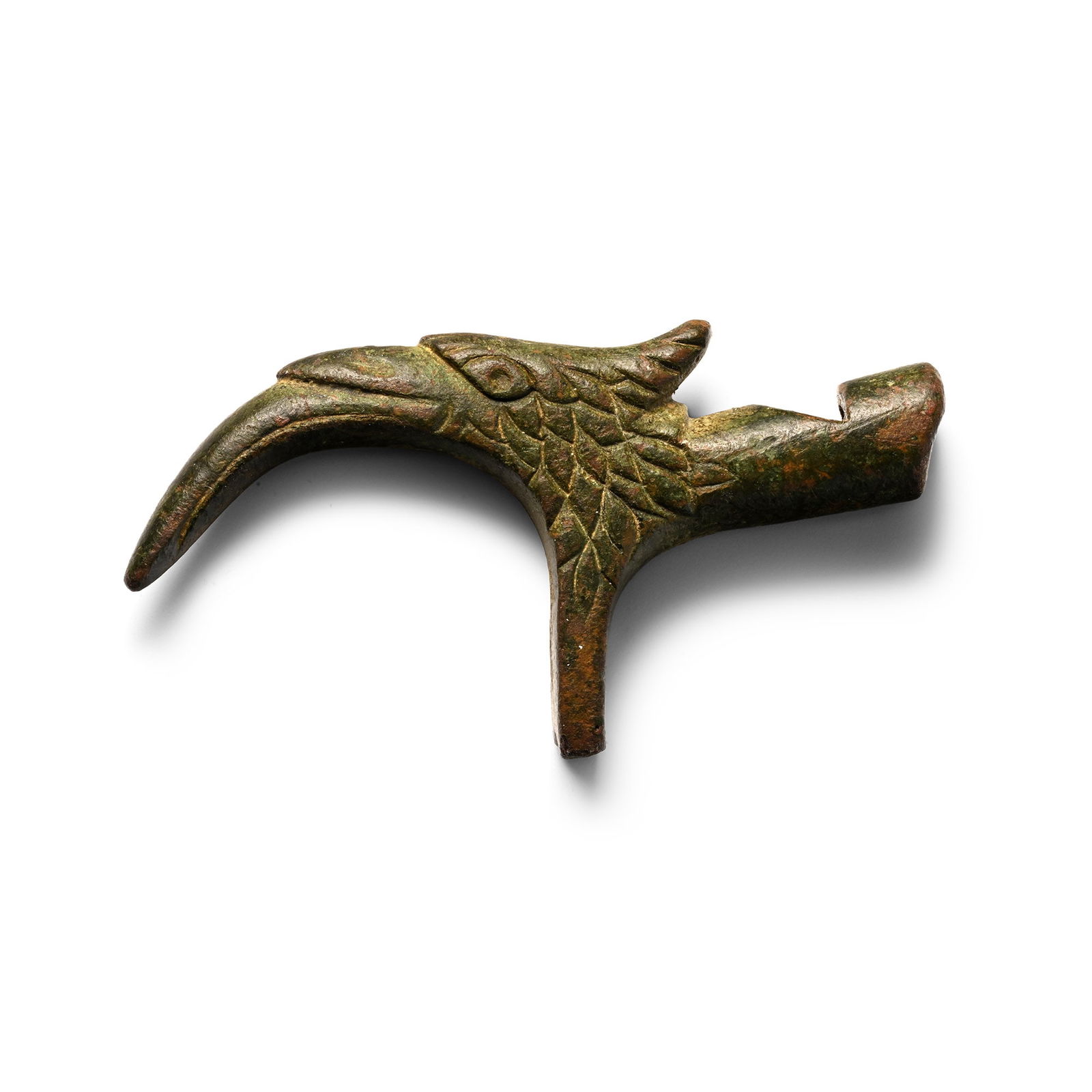 Tudor Bronze Hawking Whistle: 16th-17th century A.D. Formed as a hawk's head with detailing to the beak, eye, and plumage; round-section whistle with sub-triangular air hole. Cf. Leahy, K. and Lewis, M., The British Museum's Porta