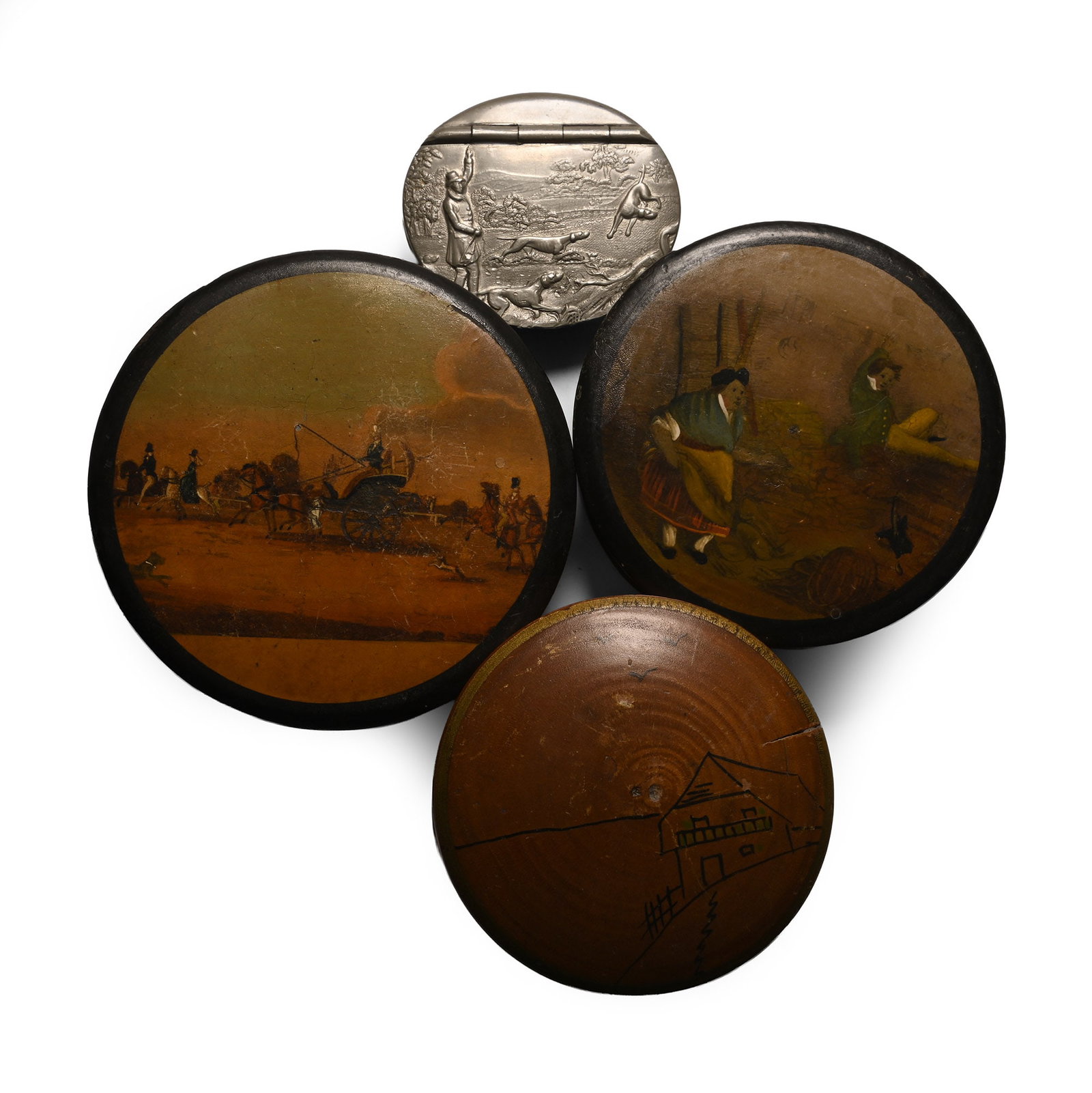 Trinket Box Group: Late 19th century A.D. Comprising a pewter box with a hunting scene lid, two shallow wooden boxes with painted scene on the lid, one taller box with a naive style house on the lid. 185 grams total, 56
