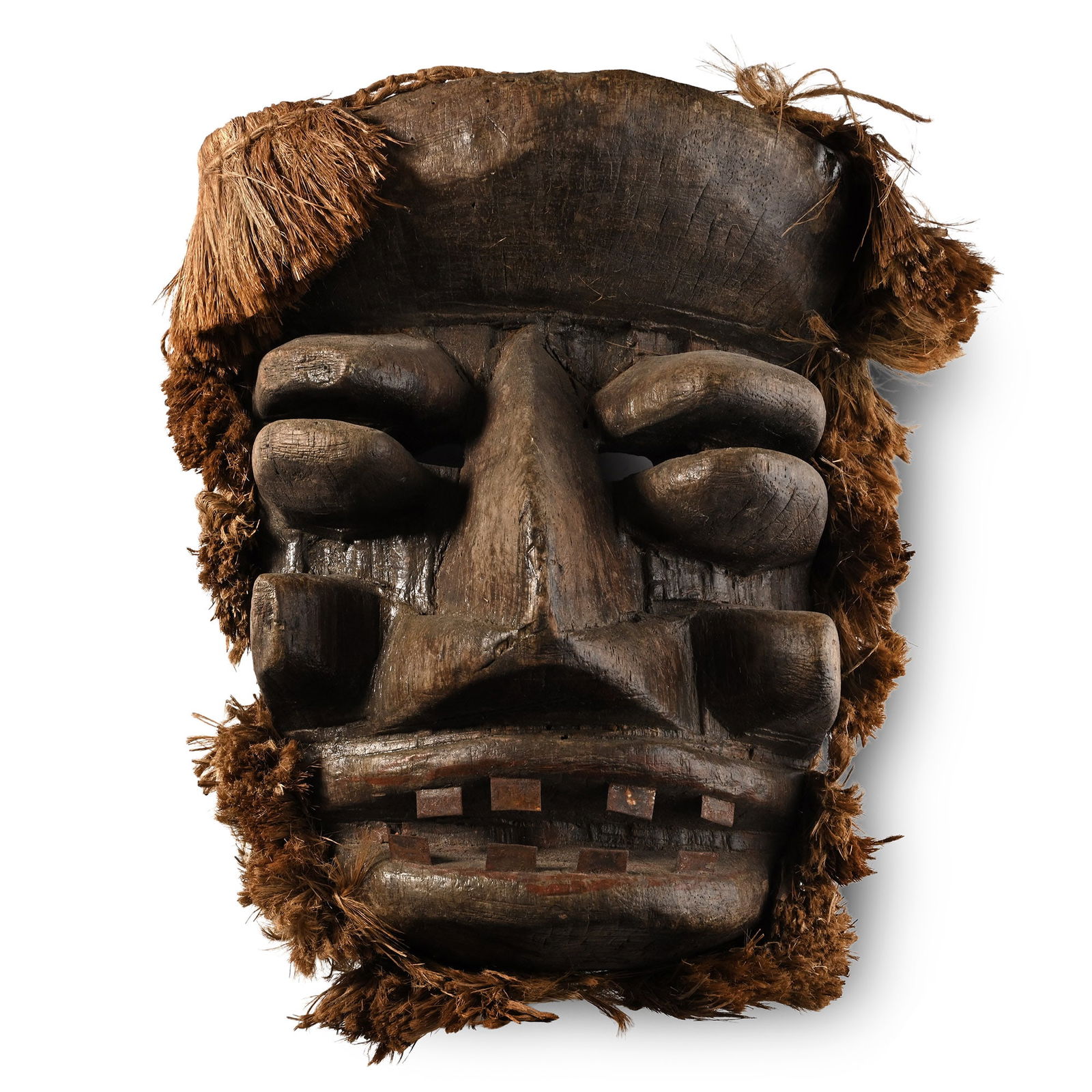 African Wooden Cermonial Face Mask: We Tribe, early-mid 20th century A.D. Carved with tubular eyes, a wide mouth with metal plate teeth, a broad nose and raffia hair around the whole mask. 1.15 kg, face long: 28.5 cm (11 1/4 in.). [No R