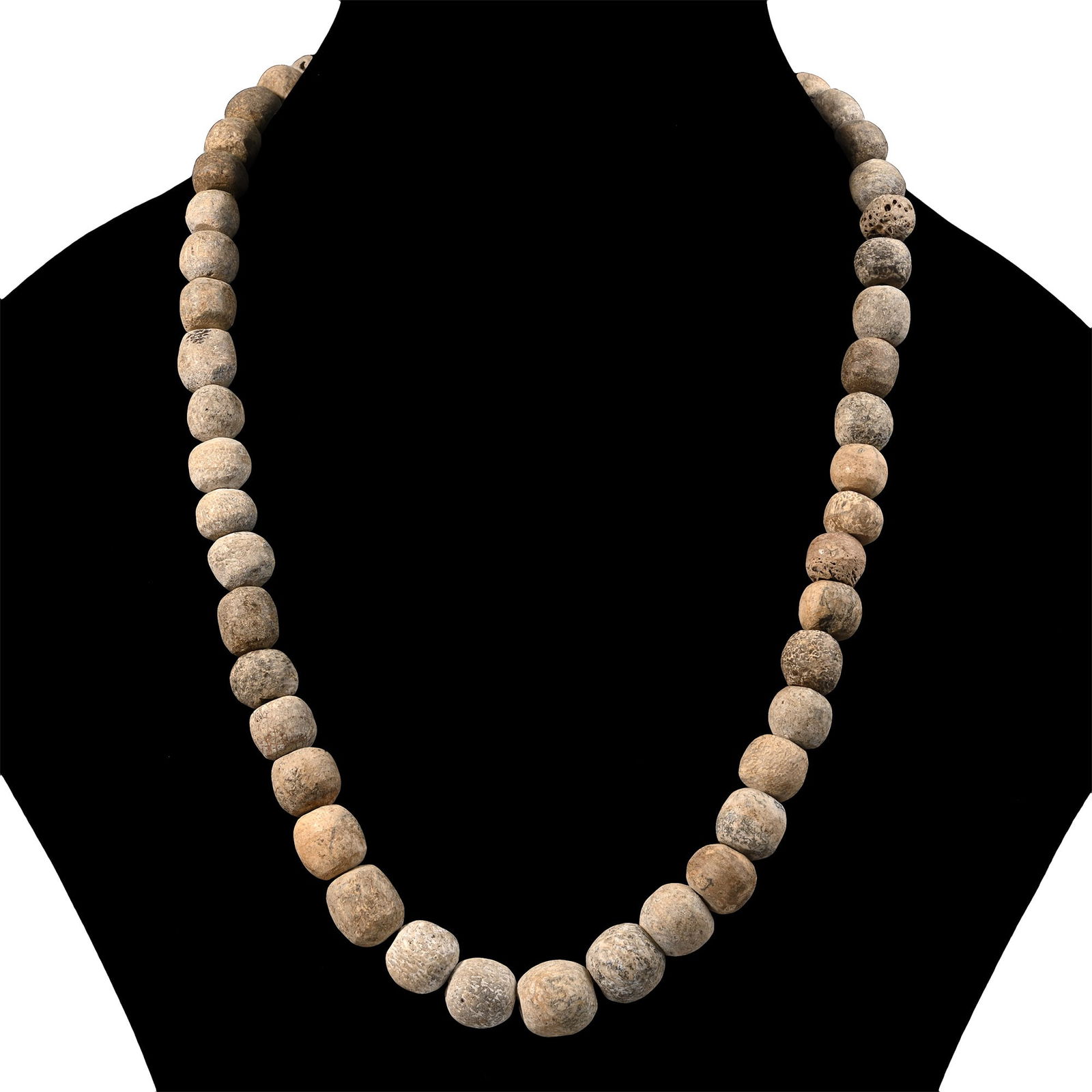 Woolly Mammoth Bone Bead Necklace String: Pleistocene Epoch, 2.6 million-11,700 years B.P. Restrung using recently polished Mammuthus primigenius bone beads. See Guide to the Elephants (Recent and Fossil) in the British Museum (Natural Histor