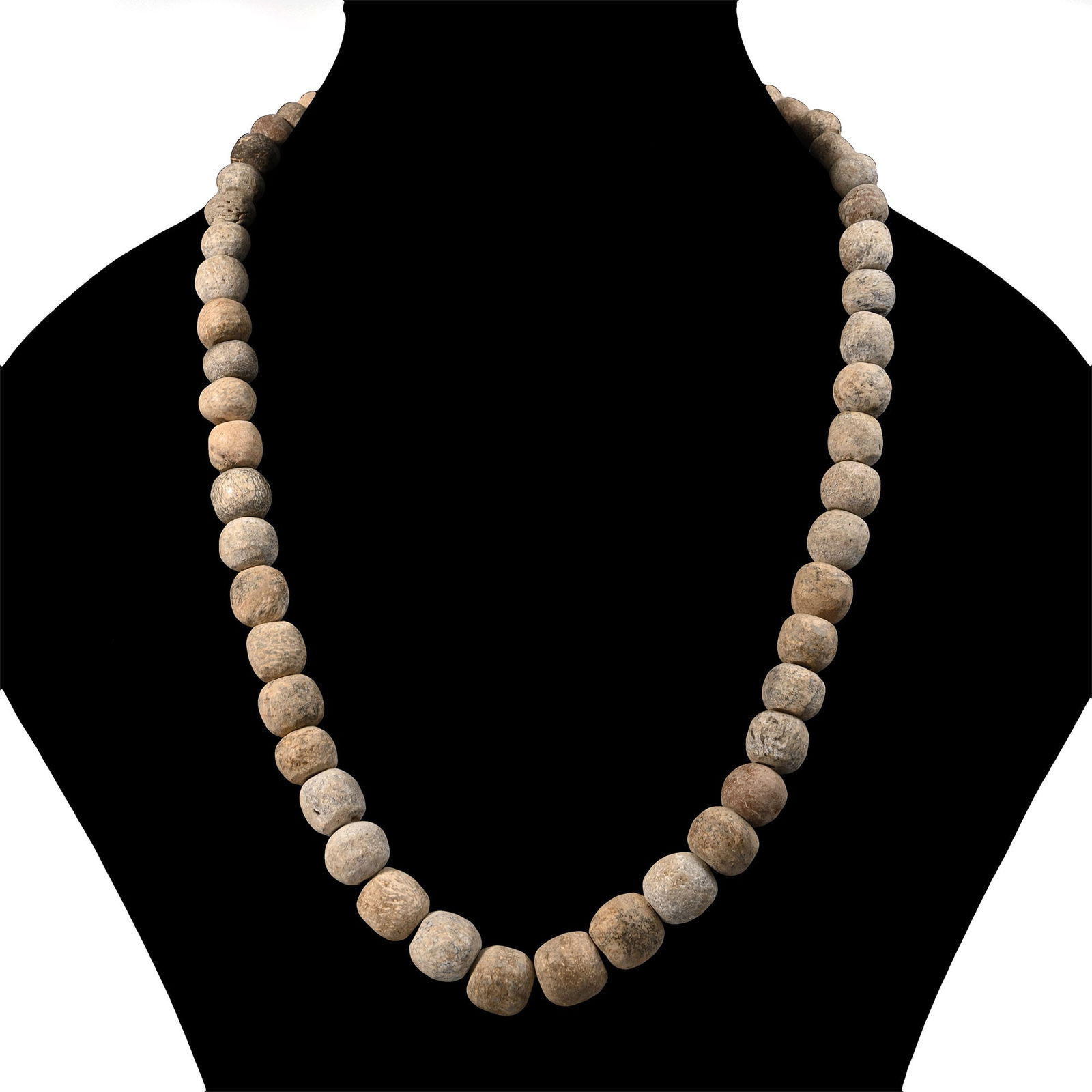 Woolly Mammoth Bone Bead Necklace String: Pleistocene Epoch, 2.6 million-11,700 years B.P. Restrung using recently polished Mammuthus primigenius bone beads. See Guide to the Elephants (Recent and Fossil) in the British Museum (Natural Histor