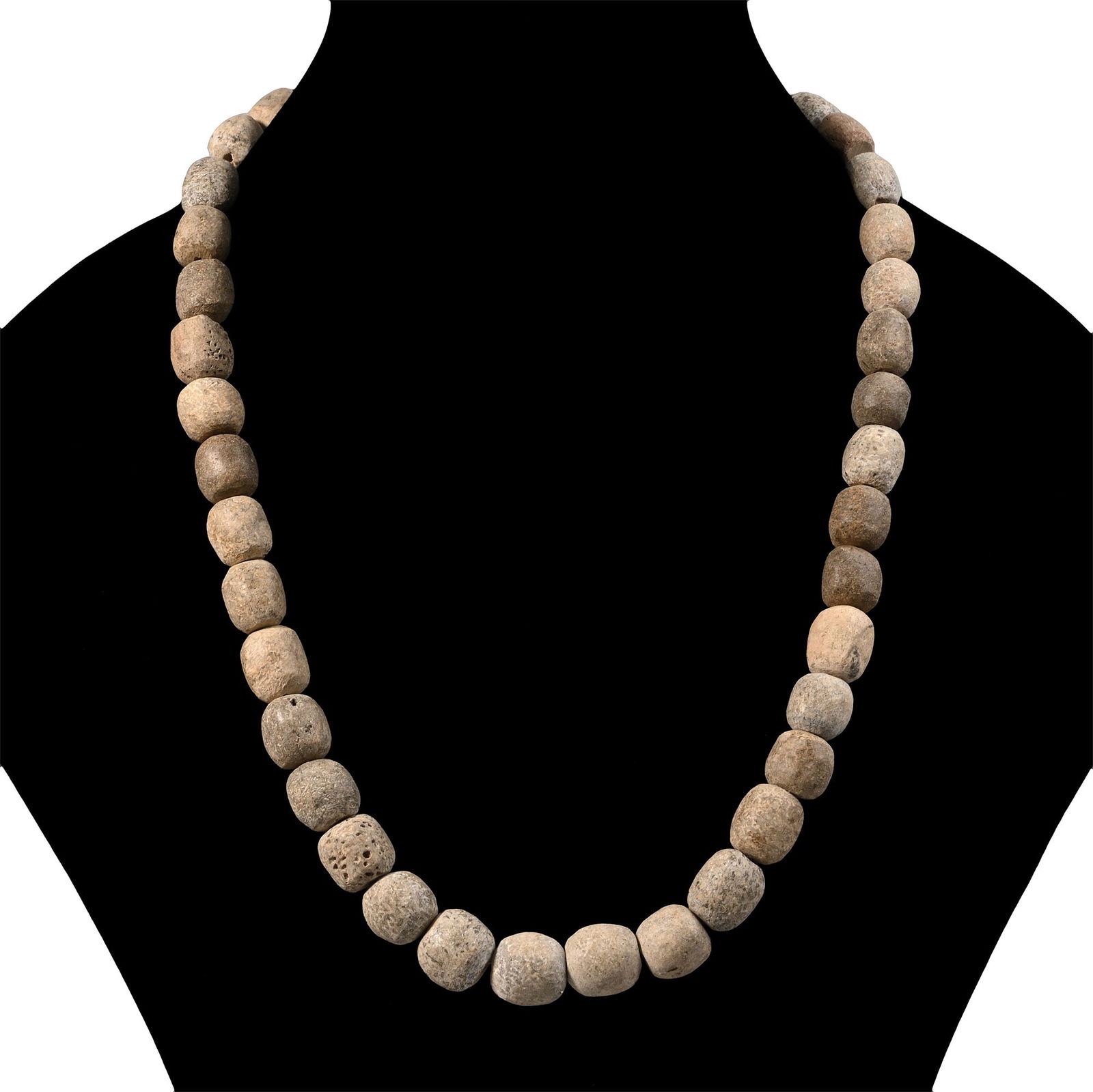 Woolly Mammoth Bone Bead Necklace String: Pleistocene Epoch, 2.6 million-11,700 years B.P. Restrung using recently polished Mammuthus primigenius bone beads. See Guide to the Elephants (Recent and Fossil) in the British Museum (Natural Histor