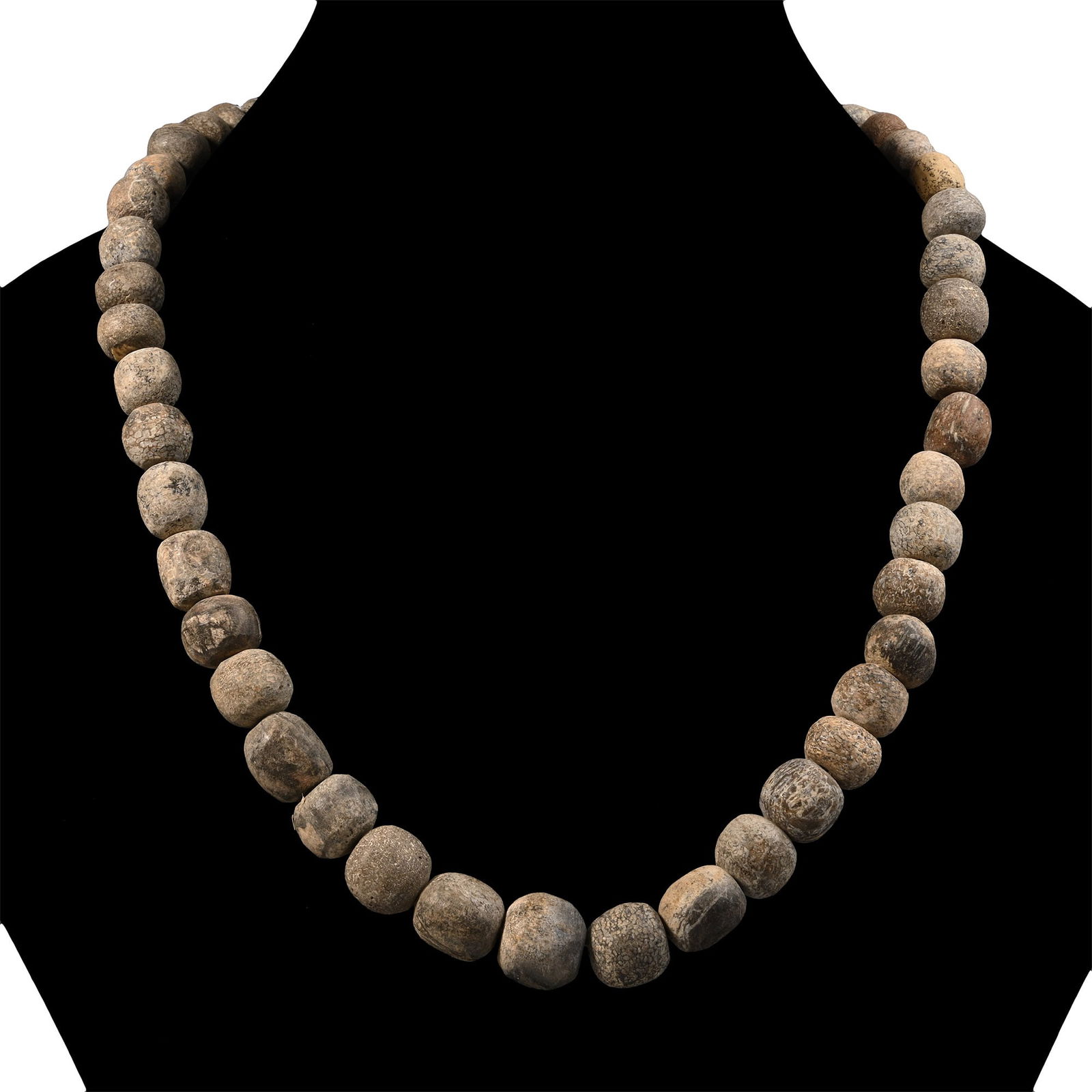 Woolly Mammoth Bone Bead Necklace String: Pleistocene Epoch, 2.6 million-11,700 years B.P. Restrung using recently polished Mammuthus primigenius bone beads. See Guide to the Elephants (Recent and Fossil) in the British Museum (Natural Histor