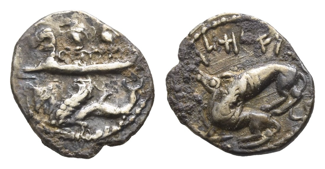Phoenicia. Byblos, 'Aynel (Enylos) AR 1/16 Shekel.: Circa 350-316/5 BC. Two hoplites, holding shields, on galley to left above waves, prow ending in lion's head; below, hippocamp to left / Lion attacking bull to left. E&E-B Series IV.4.2; HGC 10, 139.
