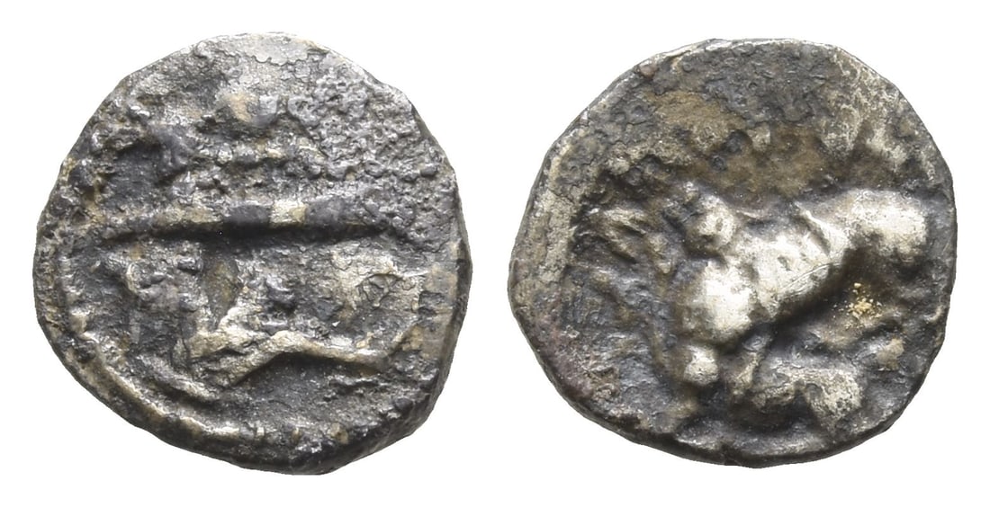 Phoenicia. Byblos AR 1/16 Shekel.: 4th century BC. Galley to left, containing two hoplites with helmets and round shields; hippocamp to left below / Lion attacking bull to left. Cf. HGC 10, 139. 0.67gr, 10mm, 12h. (For this specific lo