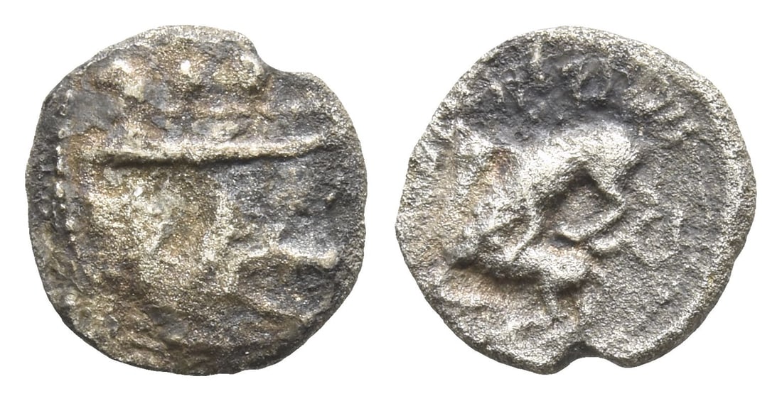 Phoenicia. Byblos AR 1/16 Shekel.: 4th century BC. Galley to left, containing two hoplites with helmets and round shields; hippocamp to left below / Lion attacking bull to left. Cf. HGC 10, 139. 0.56gr, 10mm, 6h. (For this specific lot
