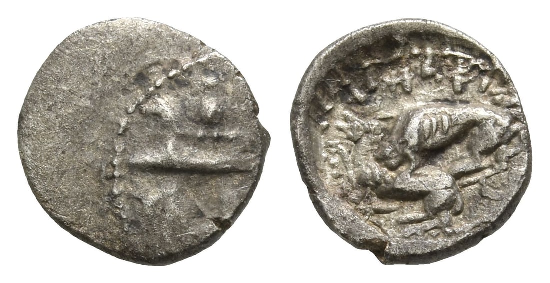 Phoenicia. Byblos AR 1/16 Shekel.: 4th century BC. Two hoplites, holding shields, on galley to left, prow ending in lion's head; below, hippocamp to left / Lion attacking bull to left. Cf. E&E-B Group IV.4.2 ('Aynel); cf. HGC 10, 139 (