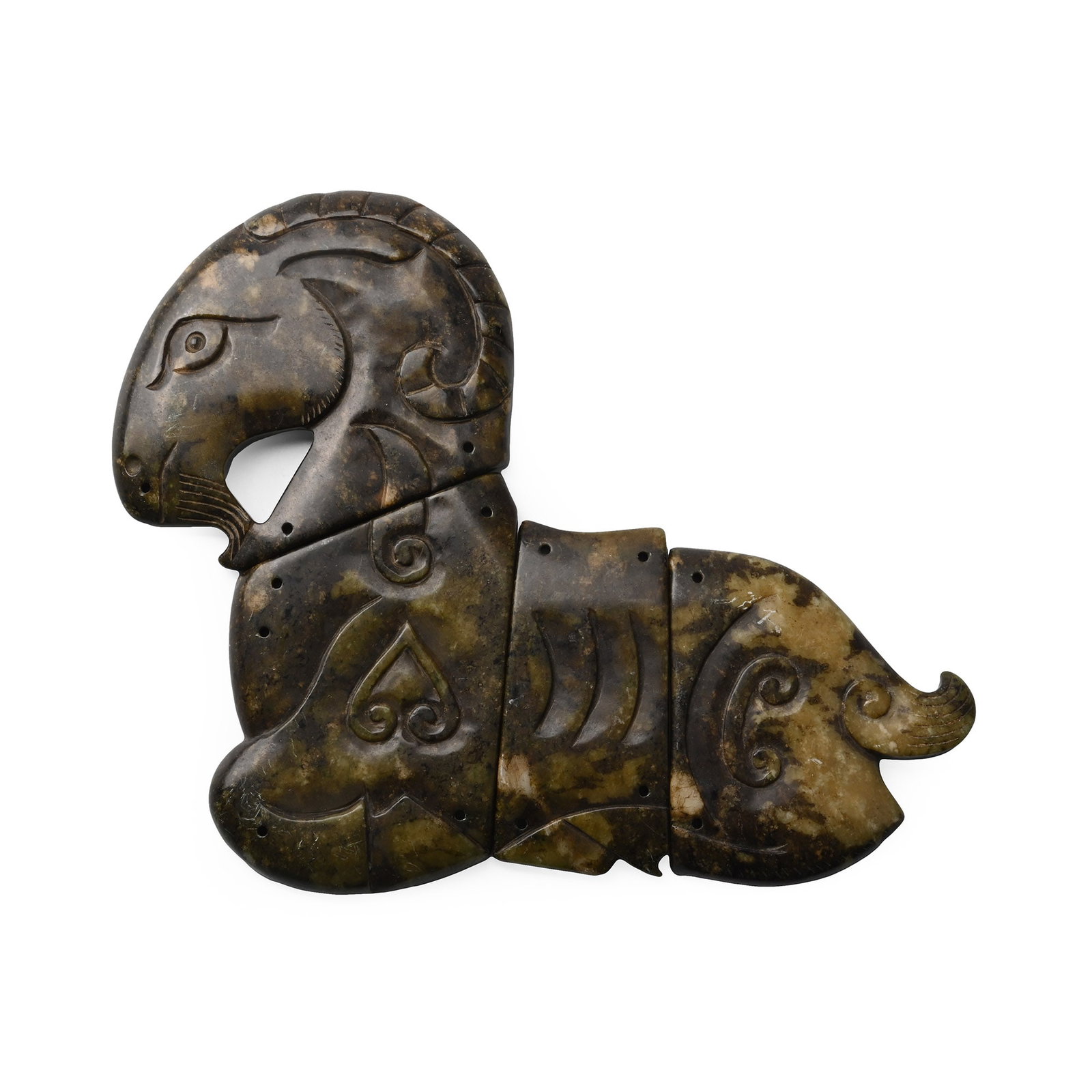 Tibetan Serpentine Ram Plaque Set: 20th century A.D. Carved in the half-round, four serpentine panels with fixing holes to the edges, combining to form a profile image of a ram with its legs folded beneath the body. 300 grams total, 71