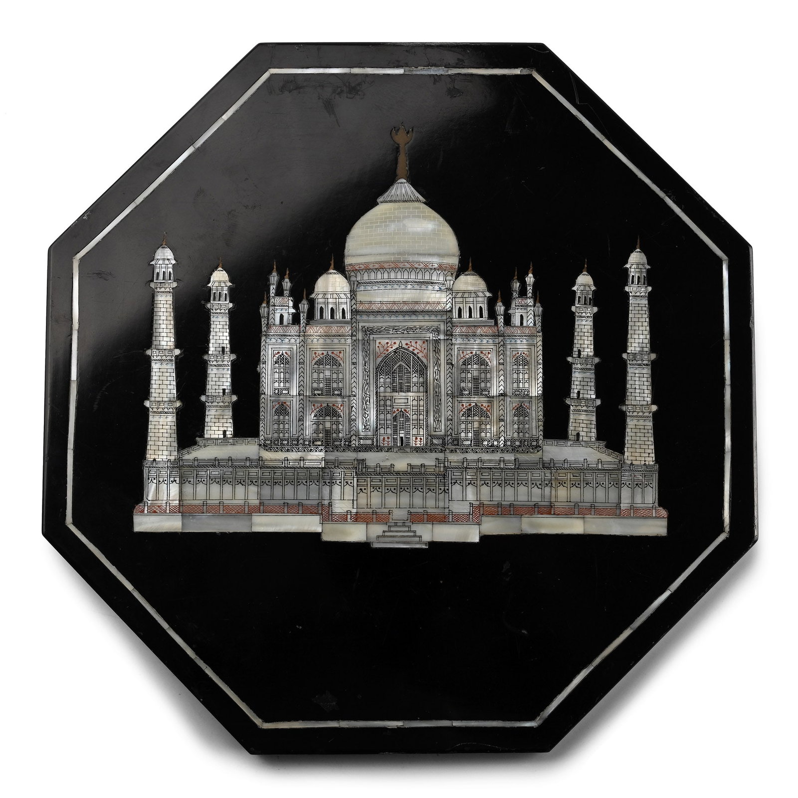 Large Indian Stone Tile with Inlaid Taj Mahal: 20th century A.D. Octagonal in plan with inlaid border and detailed image of the Taj Mahal in nacre with scored and inked detailing. 1.69 kg, 28 cm (11 in.). Private collection, UK. TimeLine Auctions