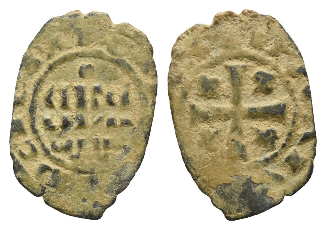 Uncertain Medieval AE Unit.: Circa 10th-4th century AD. Legend around central legend in three lines / Legend around central cross pattée with letters in angles. 0.46gr, 17mm. Good Fine. From the collection of a gentleman, acquir