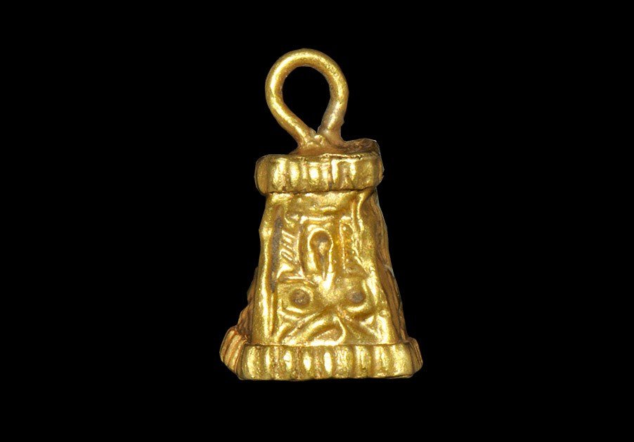 Byzantine Gold Bell Pendant: 9th-12th century AD. A miniature sheet gold bell, square in plan with loop above, gold wire clapper inside; each face with a repoussé trefoil motif, billetted band above and below. 2.24 grams, 18 mm 