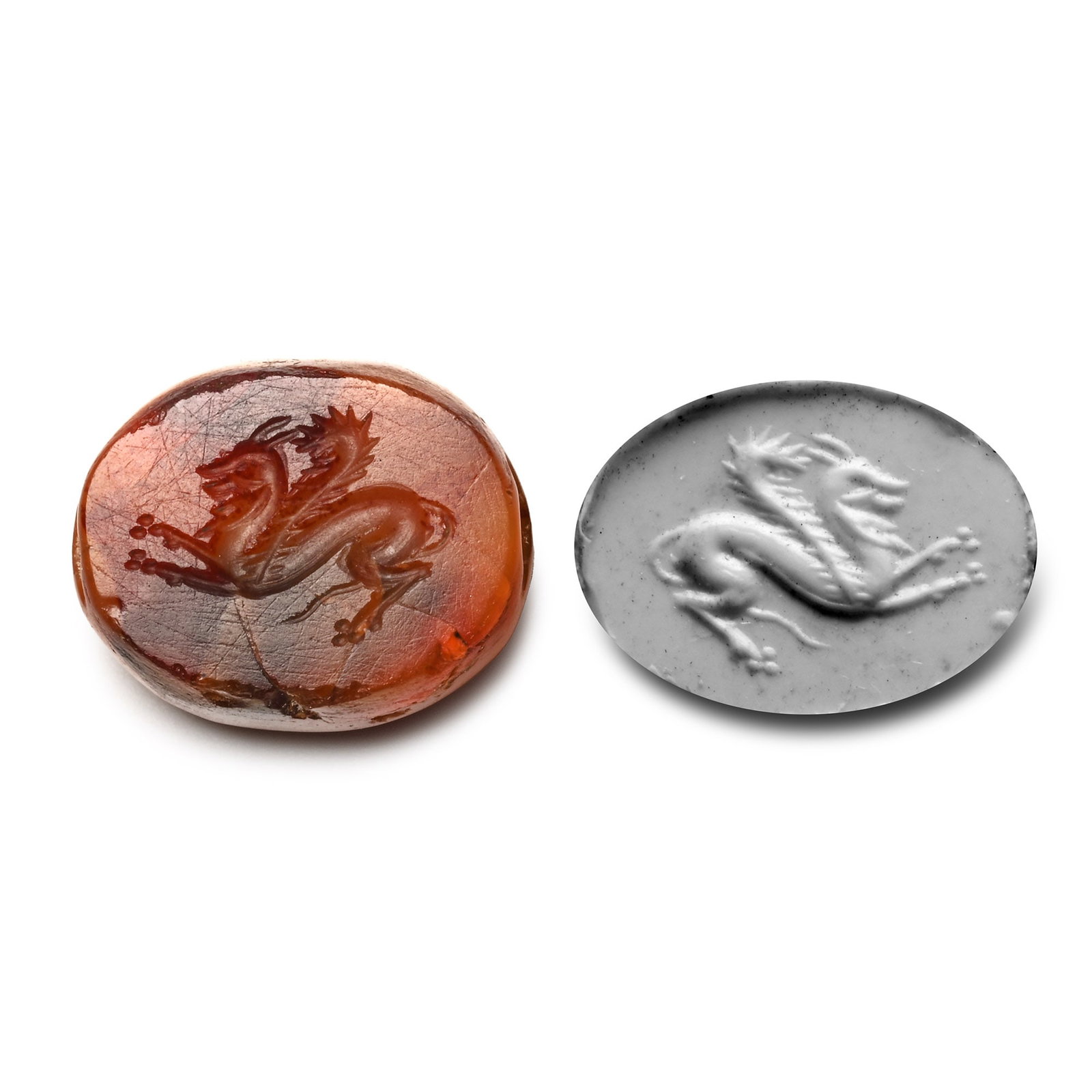 Roman Carnelian Gemstone with Chimera: 2nd-3rd century A.D. With intaglio winged beast, forelegs extended; supplied with a museum-quality impression. 1.57 grams, 13.84 mm (1/2 in.). [No Reserve] From the private collection of a European ge