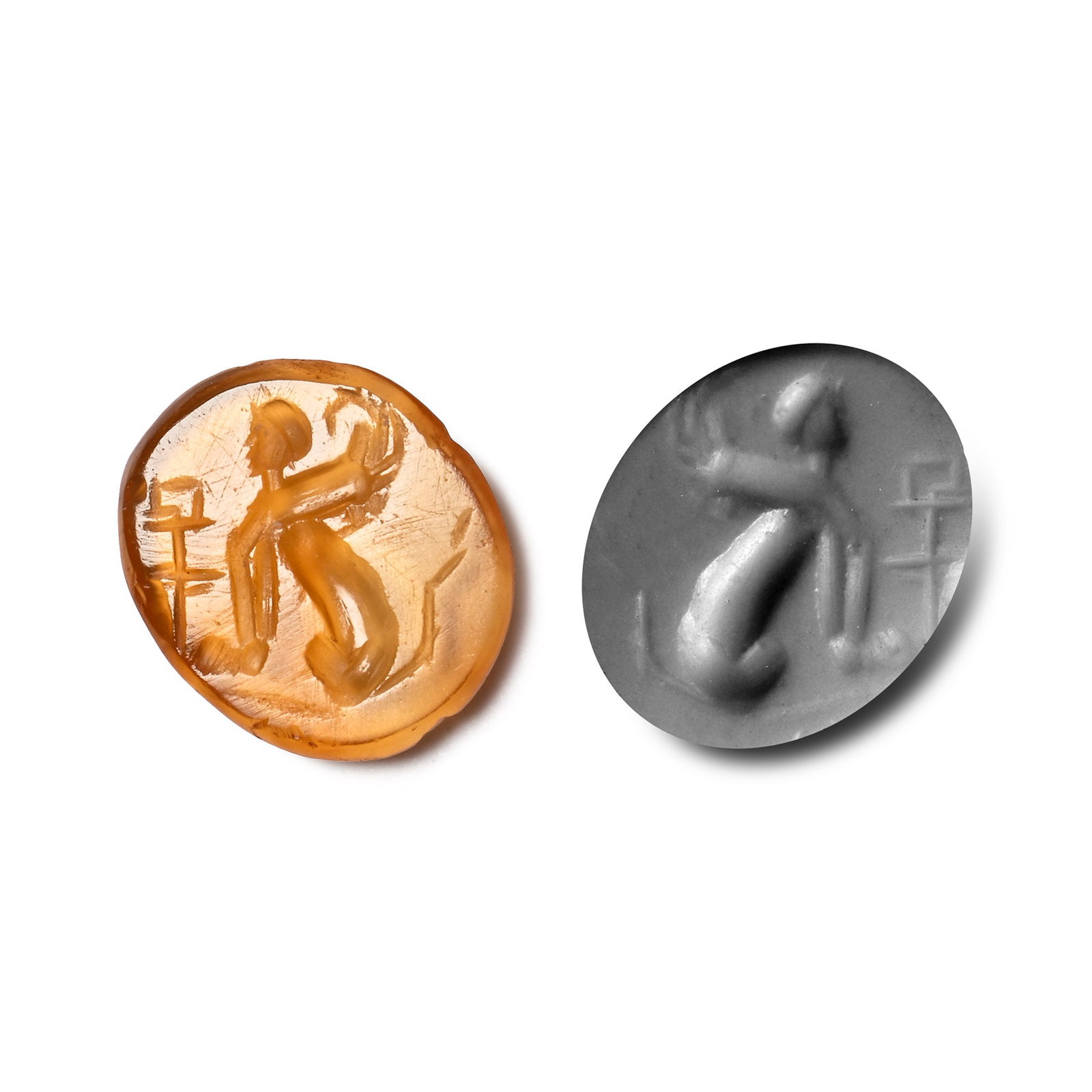 Roman Carnelian Gemstone with Sphinx: 2nd-3rd century A.D. With intaglio sphinx sitting beside a military standard; supplied with a museum-quality impression. 0.36 grams, 10.83 mm (3/8 in.). [No Reserve] From the private collection of a E