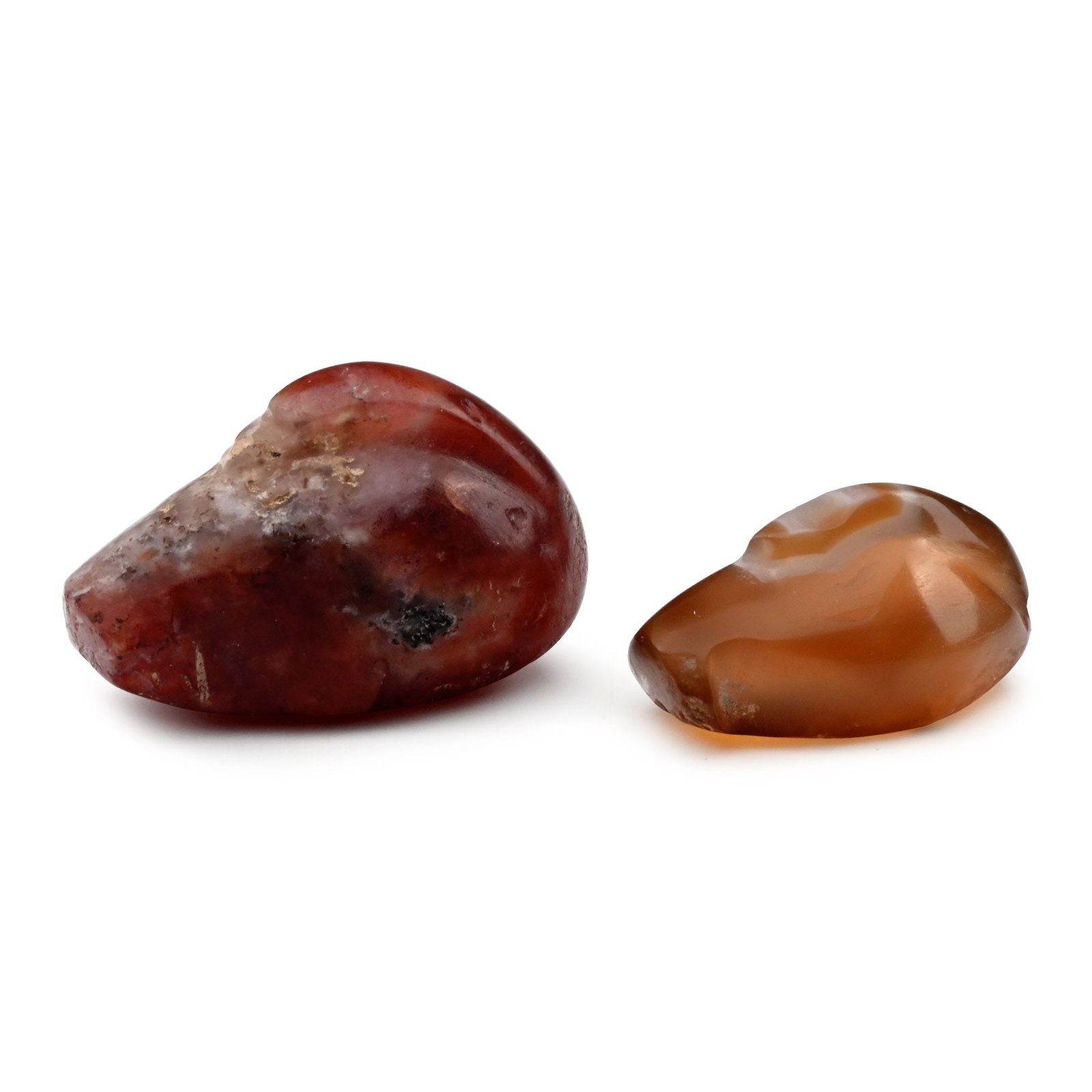 Neo-Babylonian Agate Duck Weight Collection: Circa 700-600 B.C. Each carved in the round as a duck with its head laid back along its spine. 6.67 grams total, 17-22 mm (5/8 - 7/8 in.). [2] (For this specific lot, 5% import VAT is applicable on th