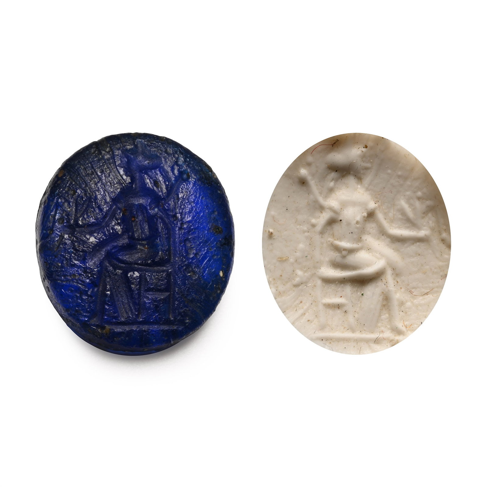 Roman Glass Gem with Juno Seated: 2nd-3rd century A.D. With intaglio Juno seated on a throne with a flower in her hand; supplied with a museum-quality impression. 0.83 grams, 12.80 mm (1/2 in.). [No Reserve] From the private collectio