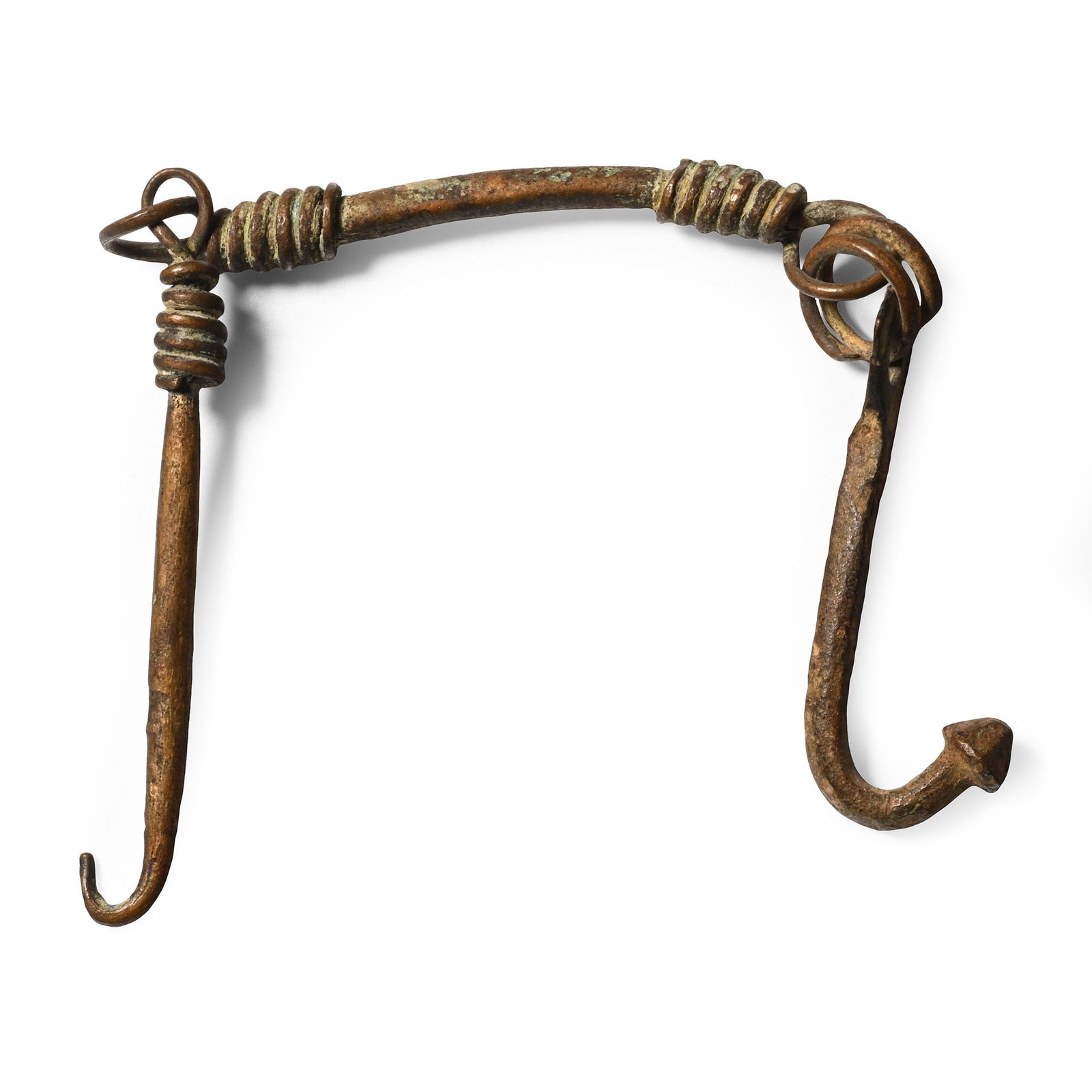 Roman Bronze Hook Mechanism: 1st-4th century A.D. Comprising a straight bar at the centre with two hooks suspended from each end. 5.94 grams, 12 cm (4 3/4 in.). [No Reserve] From the private collection of a European gentleman (19