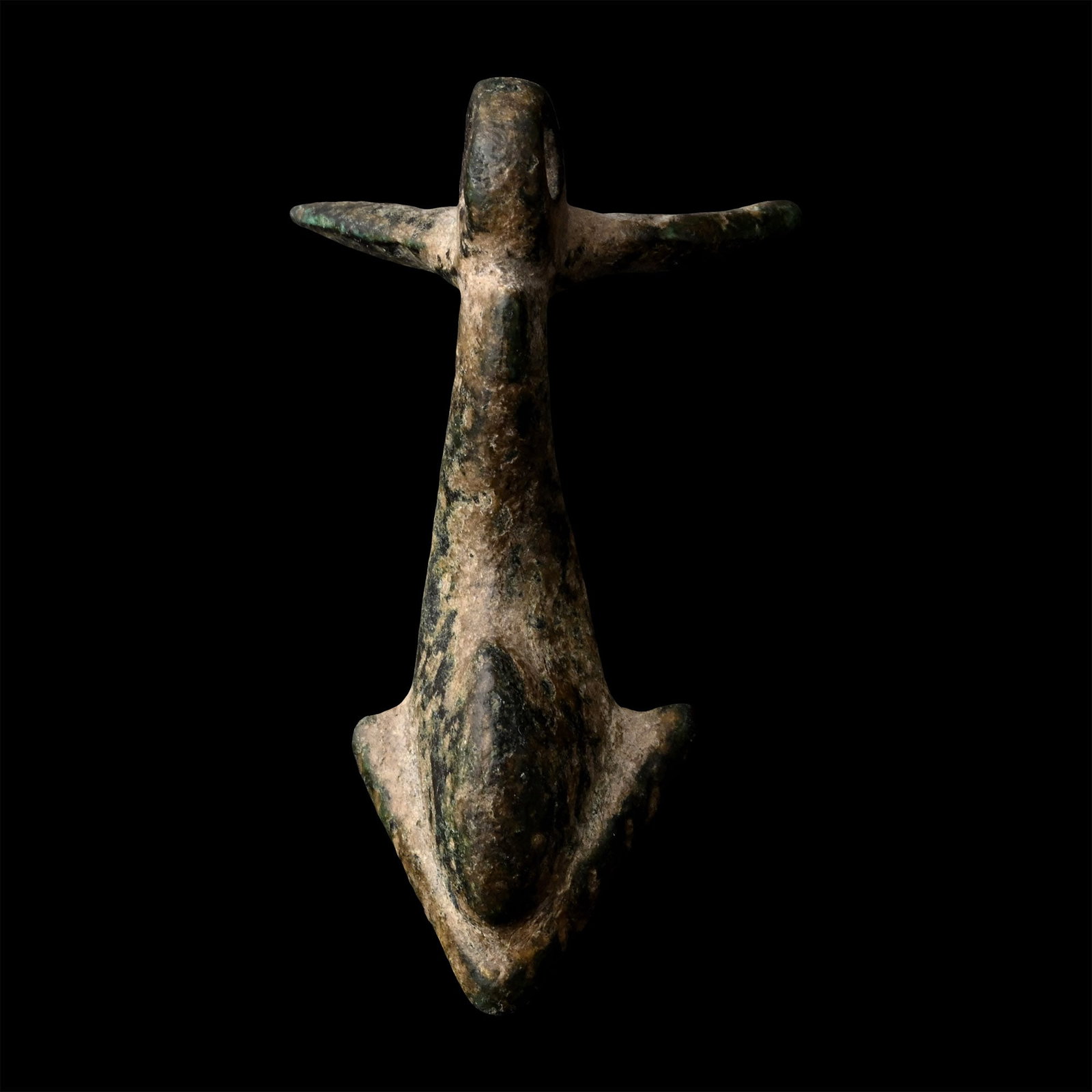 Roman Bronze Dolphin Mount: 1st-4th century A.D. Stylised figure with curving body and splayed crescentic tail with a loop above. 11.2 grams, 37.6 mm (1 3/8 in.). [No Reserve] From the private collection of a European gentleman 