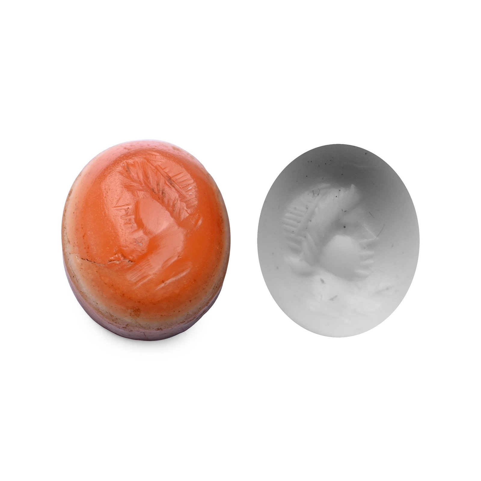 Roman Agate Gemstone with Female Bust: 2nd-3rd century A.D. With intaglio profile female bust, hair drawn up in a chignon; supplied with a museum-quality impression. 1.23 grams, 1.37 mm (1/2 in.). [No Reserve] From the private collection o