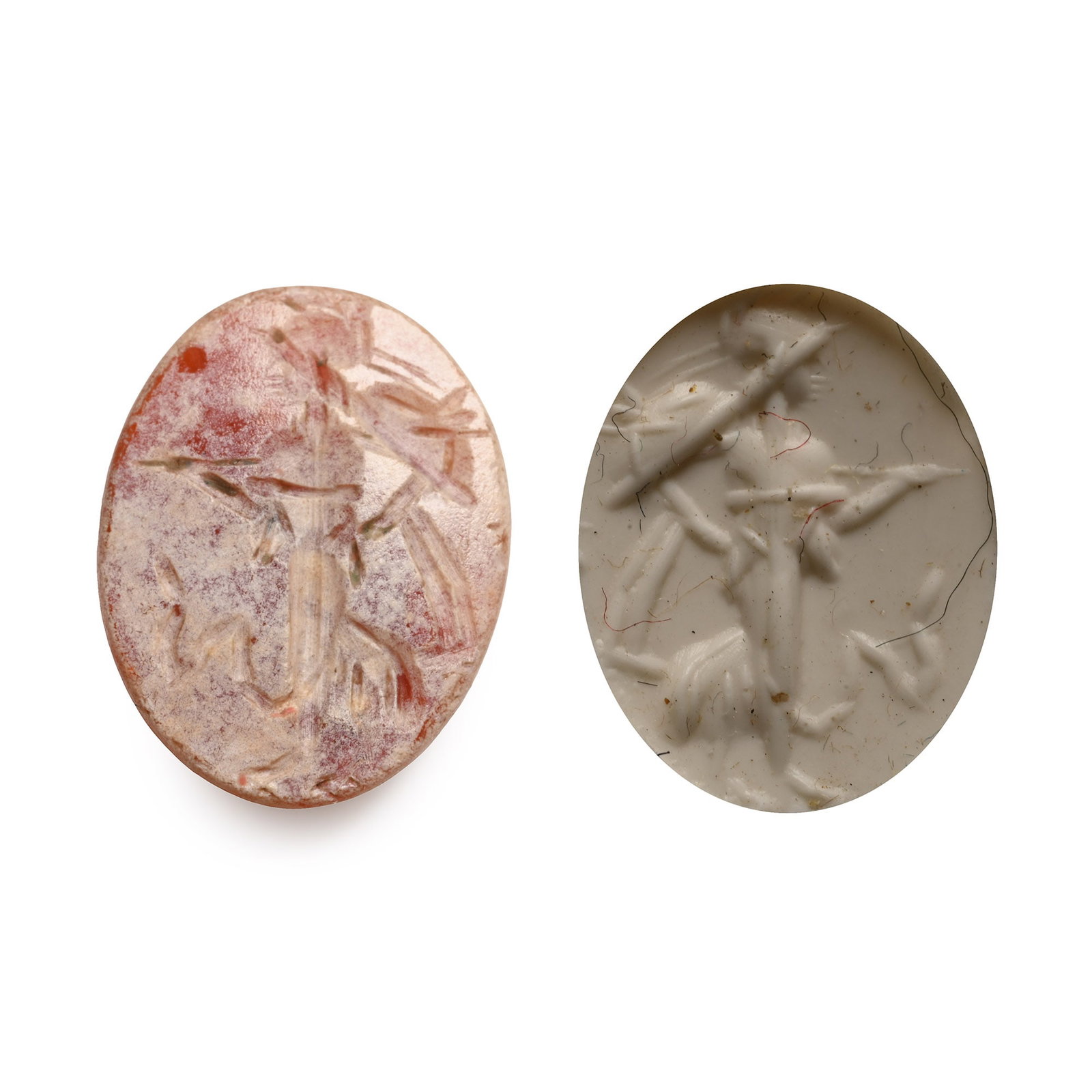 Roman Carnelian Gemstone with Robed Female: 2nd-3rd century A.D. With intaglio robed female advancing with one hand extended; supplied with a museum-quality impression. 0.55 grams, 11.97 mm (3/8 in.). [No Reserve] From the private collection of