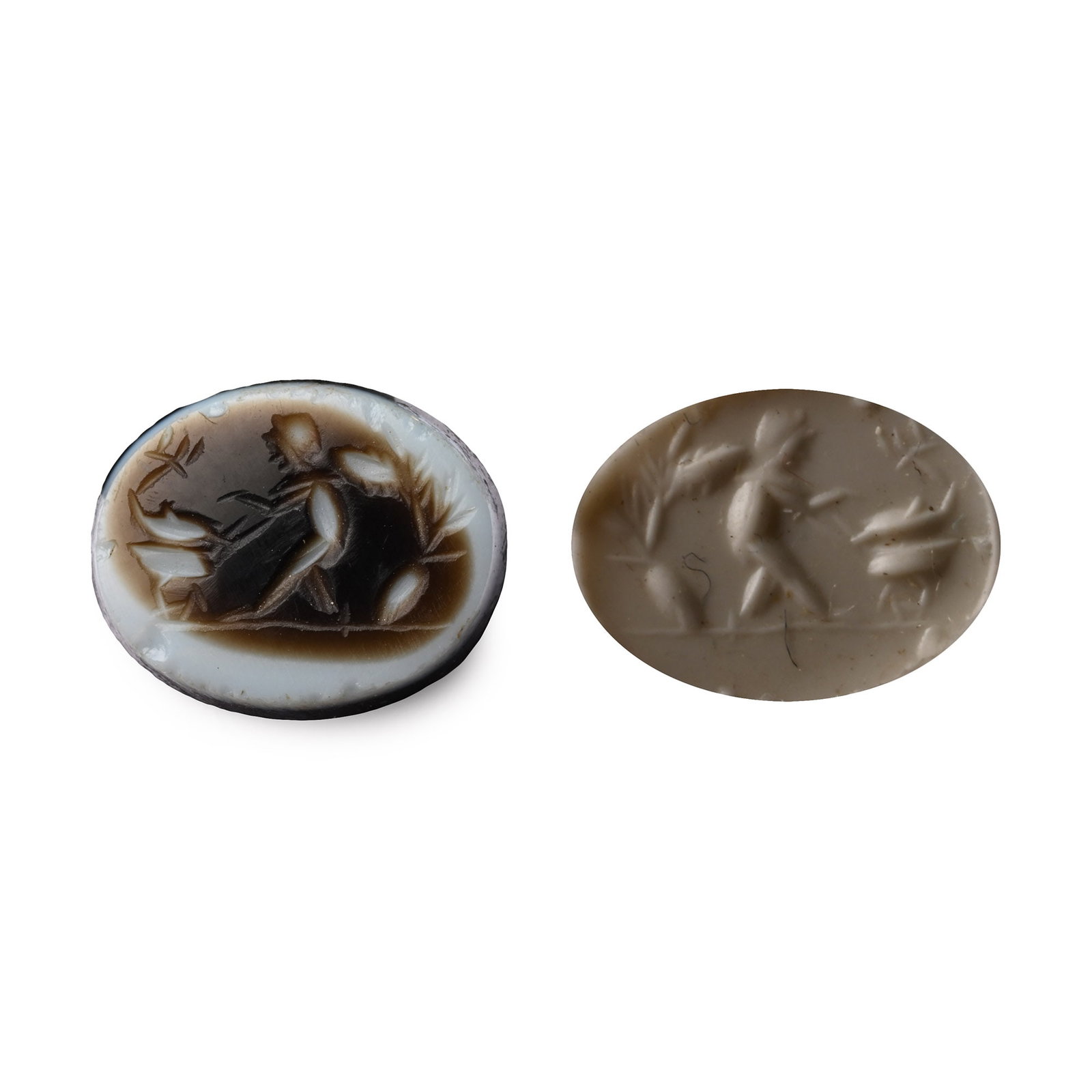 Roman Banded Agate Gemstone with Putto: 2nd-3rd century A.D. With intaglio putto in a landscape; supplied with a museum-quality impression. 0.33 grams, 10.32 mm (3/8 in.). [No Reserve] From the private collection of a European gentleman (19
