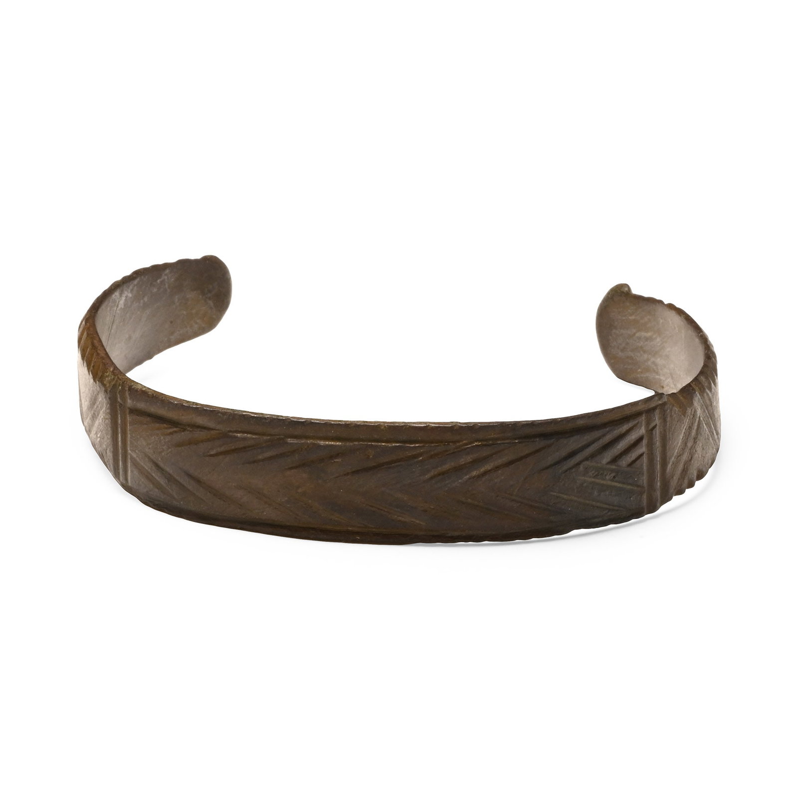 Late Roman Bronze Bracelet: 4th-6th century A.D. Penannular flat-section body with chevron decoration. 13.7 grams, 55 mm (2 1/8 in.). [No Reserve] Ex German art market, 2000s. Acquired from an EU collector living in London. From
