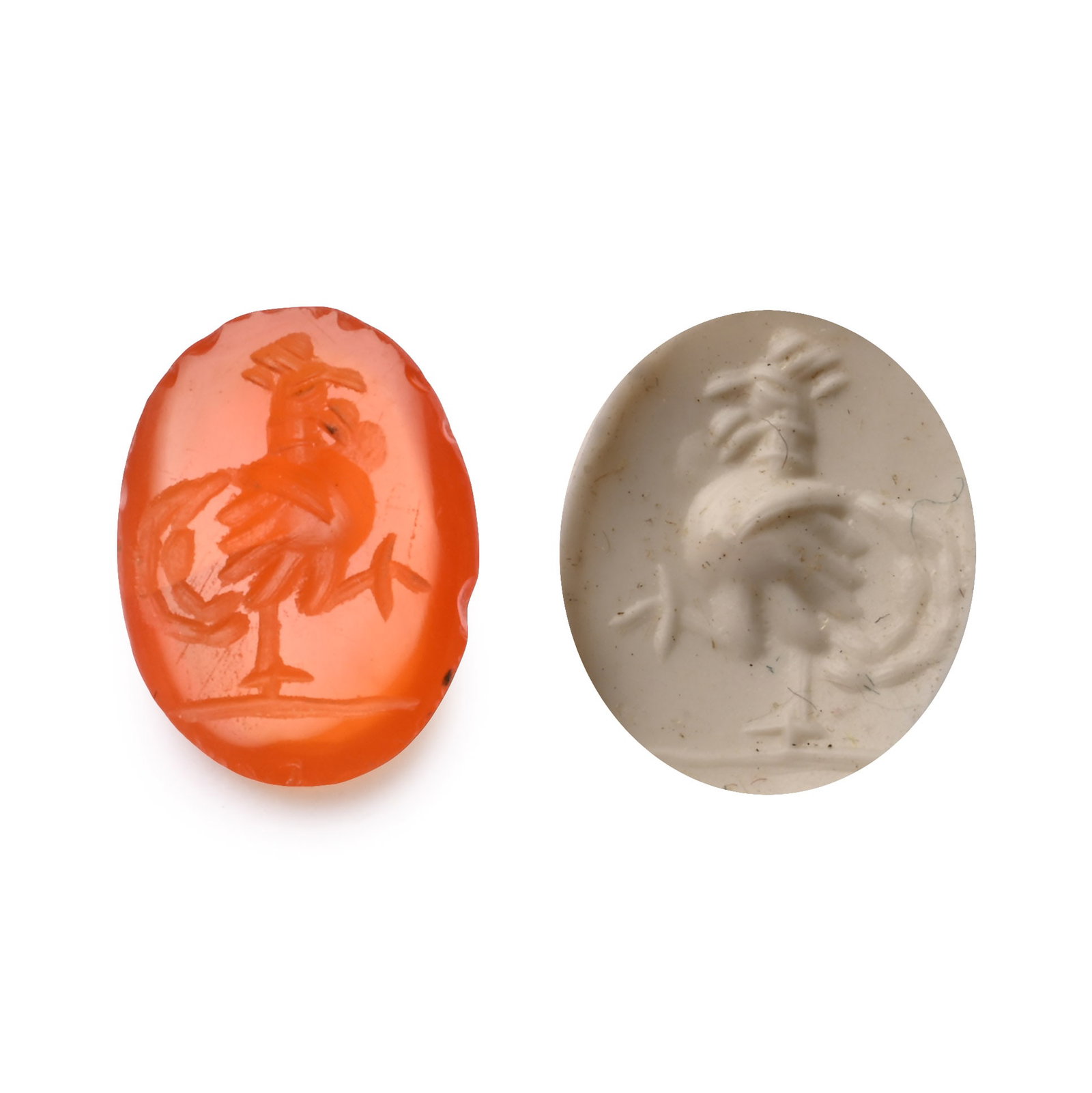 Roman Carnelian Gemstone with Cockerel: 2nd-3rd century A.D. With intaglio cockerel standing on a baseline; supplied with a museum-quality impression. 0.30 grams, 9.89 mm (3/8 in.). [No Reserve] From the private collection of a European gen