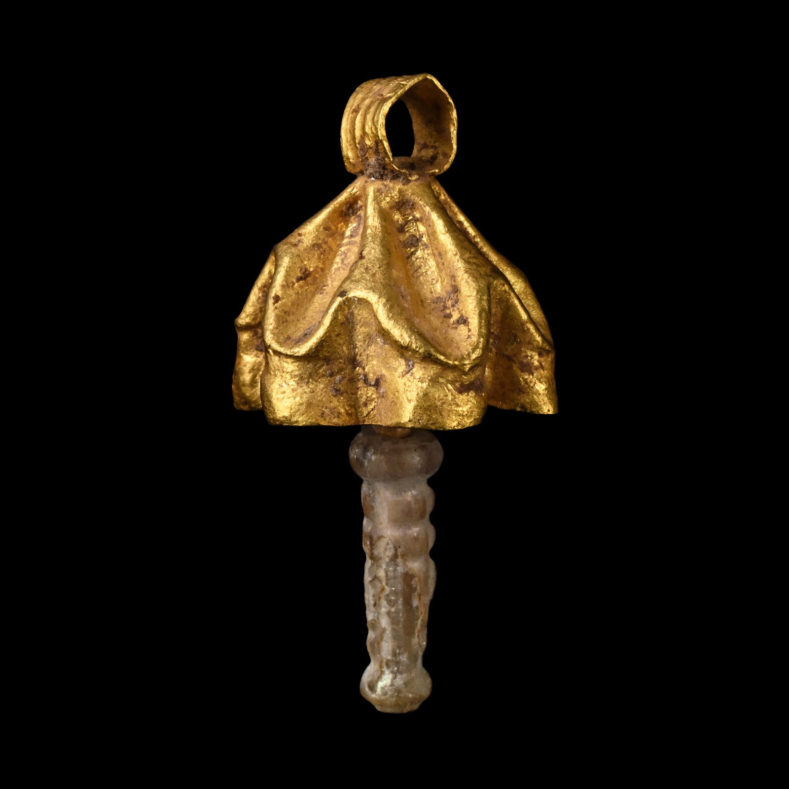 Roman Gold Bell Pendant: 1st-4th century A.D. Formed as a six-petalled flower with deeply grooved petals, a hanging loop at the centre with a separate bar attachment and a glass bead. 1.72 grams, 23.4 mm (7/8 in.). [No Reserv