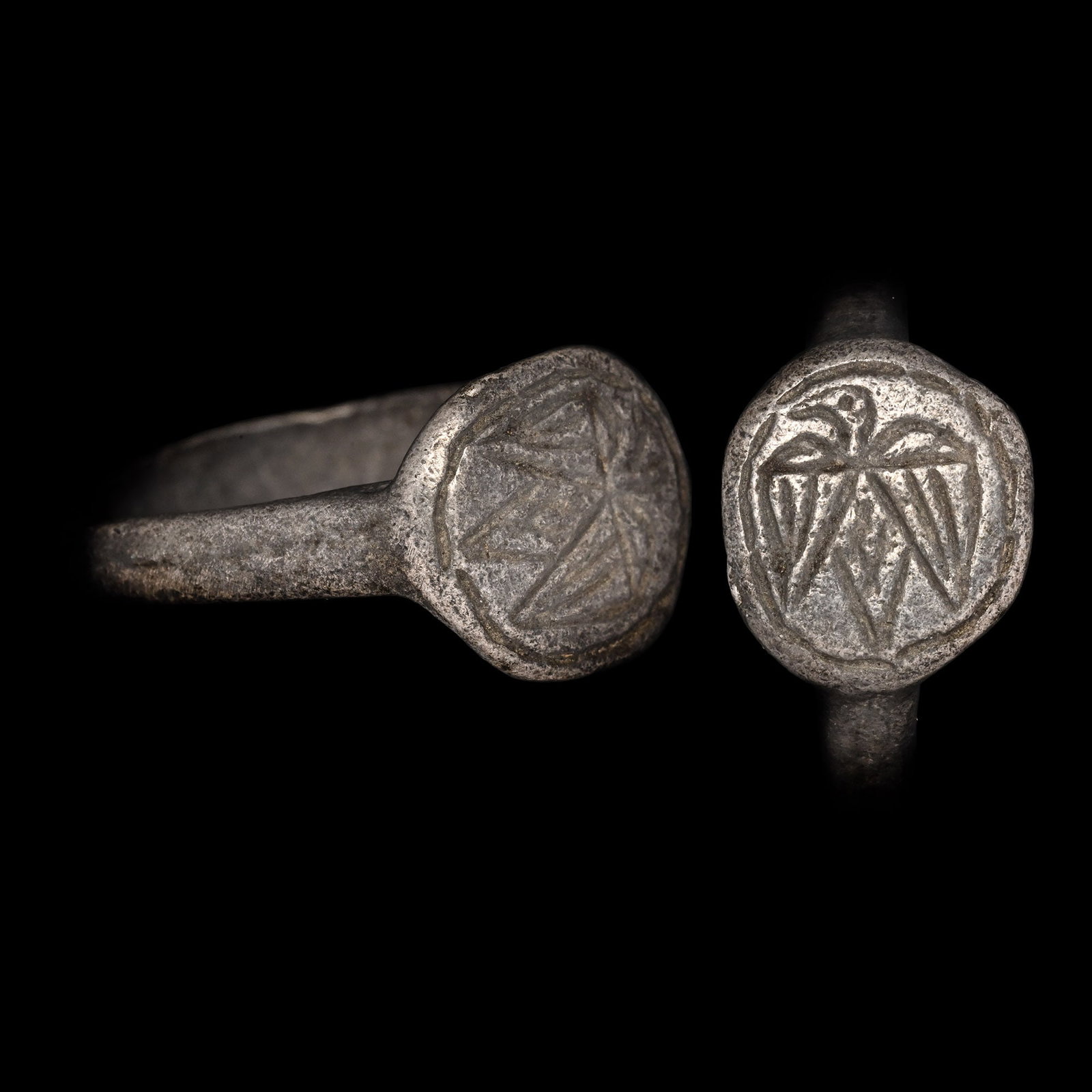 Byzantine Silver Ring with Spread Eagle: 12th-14th century A.D. D-section hoop and a circular bezel with a stylised eagle looking left. 5.82 grams, 23.22 mm overall, 18.70 mm internal diameter (approximate size British P, USA 7 1/2, Europe 1