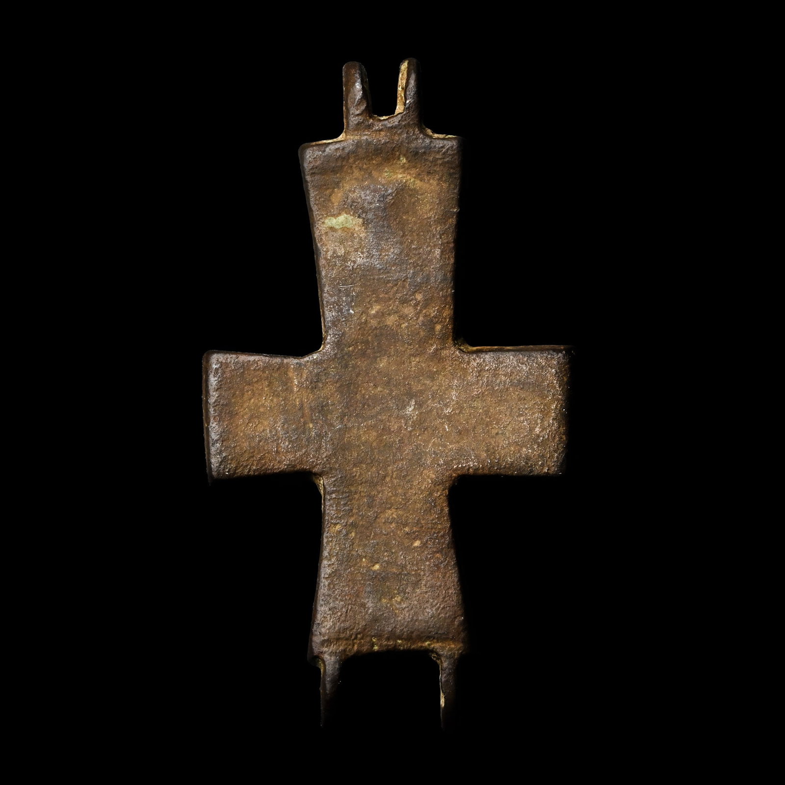 Byzantine Bronze Reliquary Cross Pendant Plate: Circa 10th-12th century A.D. A plain plate from an enkolpion with hinge-loops at each end. 7.36 grams, 48 mm (1 7/8 in.). [No Reserve] Acquired on the UK art market from the 1990s. From the private co