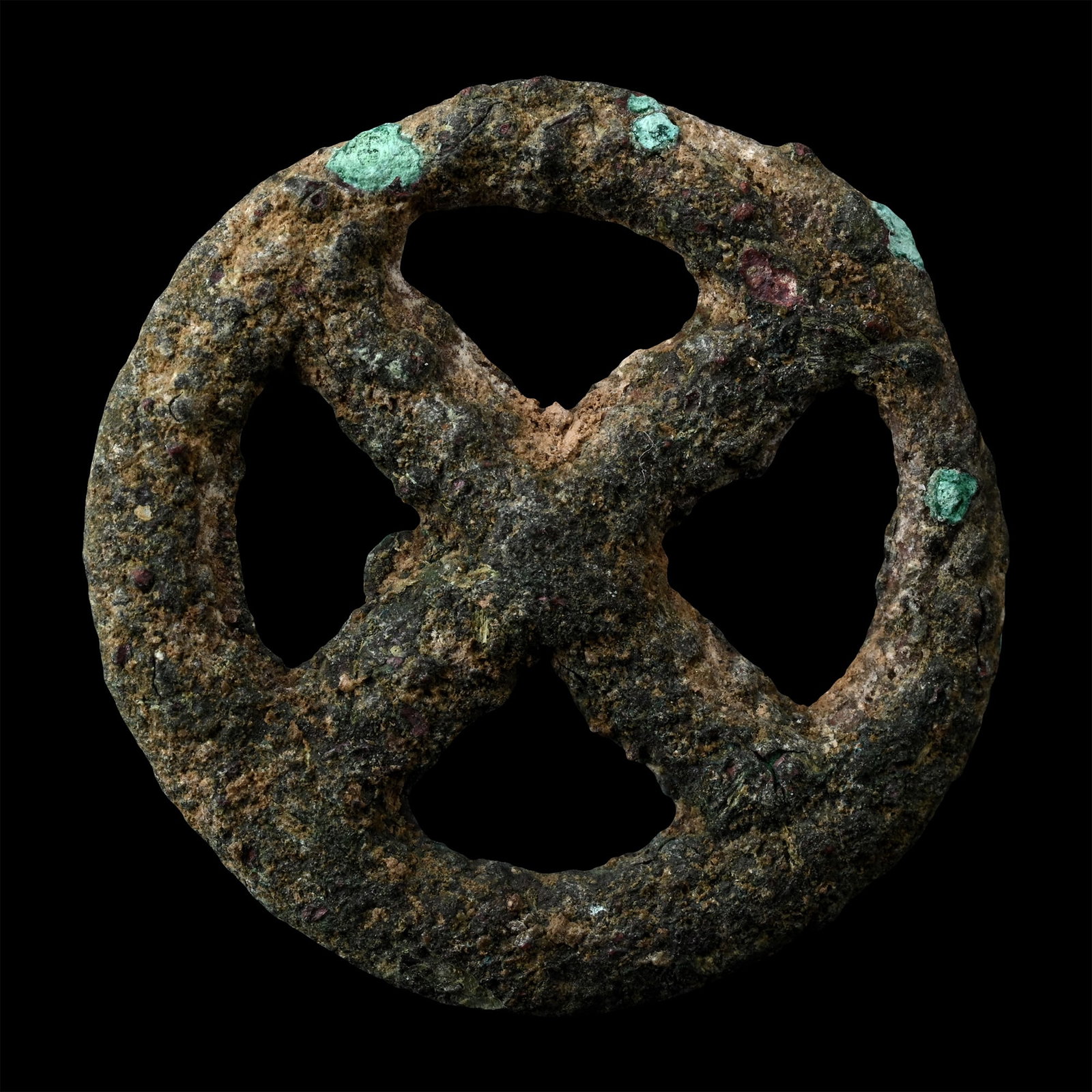 West Central Asian Bronze Stamp Seal with Cross: Bronze Age, circa 2300-2000 B.C. Discoid in plan with voided spandrels, loop to reverse. 8.59 grams, 29.59 mm (1 1/8 in.). [No Reserve] From the private collection of a European gentleman (1942-2024),
