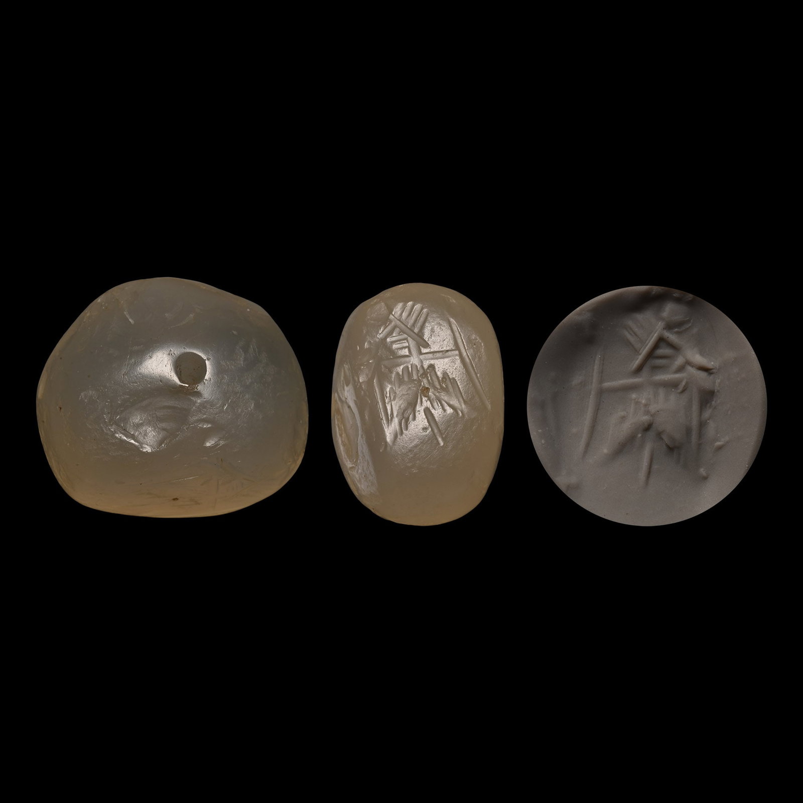 Sasanian Chalcedony Stamp Seal with Winged Figure (1 of 1)