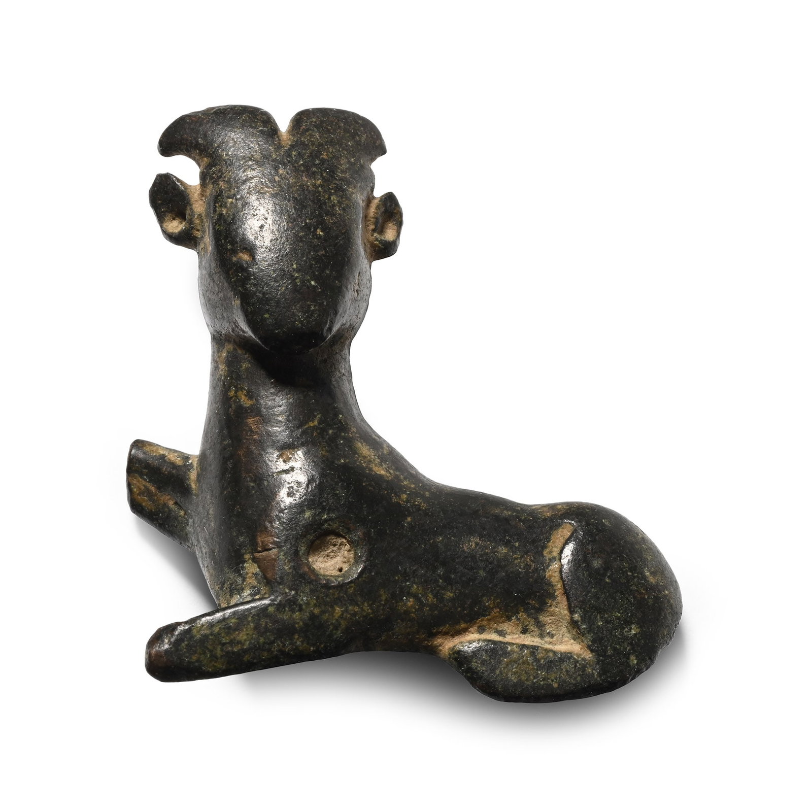 Luristan Bronze Recumbent Deer Mount: 1st millennium B.C. Modelled in the half-round with its head turned and right front leg raised, lug to the rear. 16.1 grams, 33.4 mm high (1 1/4 in.). [No Reserve] From the private collection of a Eur