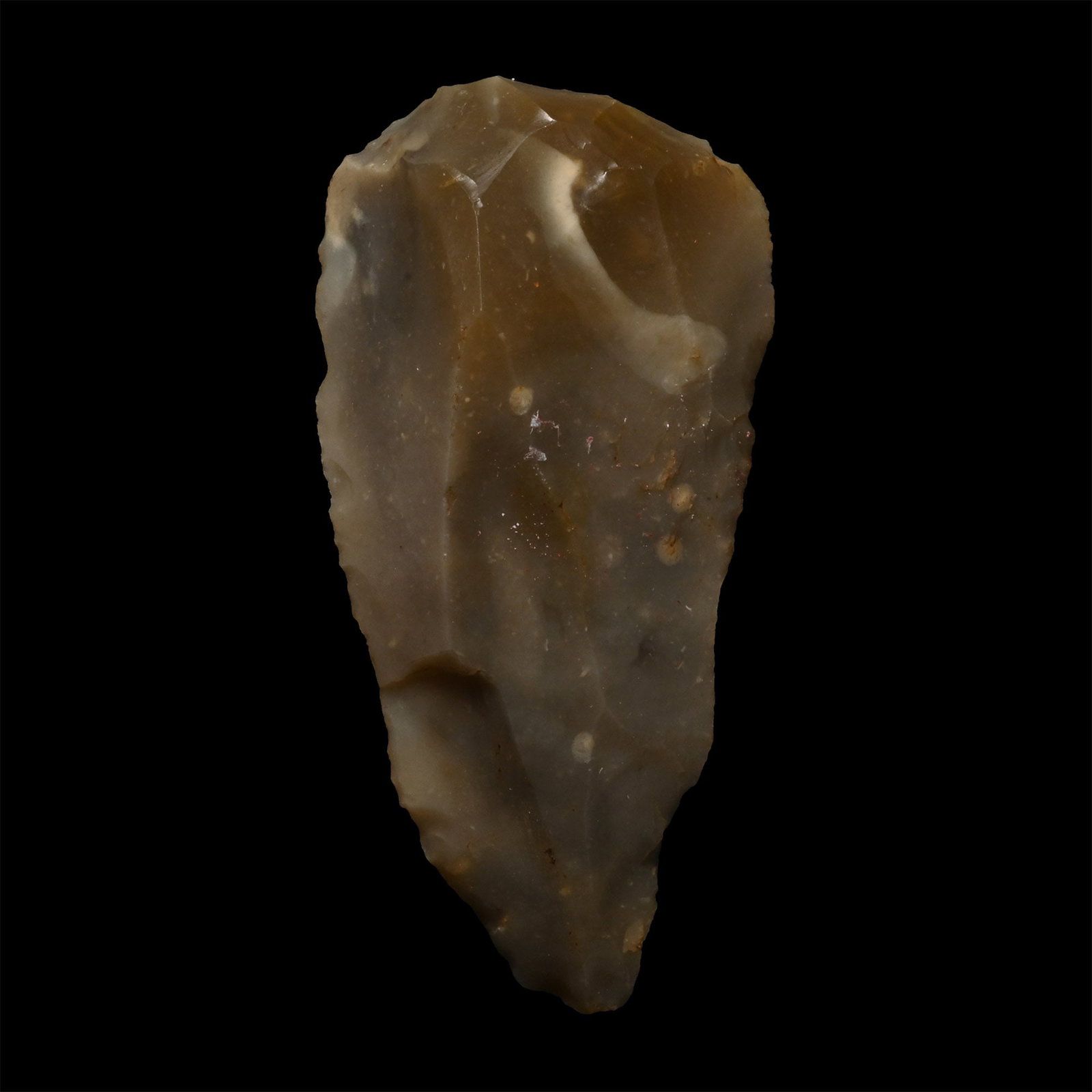 British Stone Age Bull-Nosed Knapped Flint Blade Scraper: Neolithic Period, circa 6000 years B.P. Piriform in plan with steep re-touch on the tip made from a long blade. 18.6 grams, 59 mm (2 1/4 in.). [No Reserve] Found in 1901. From the collection of Captai