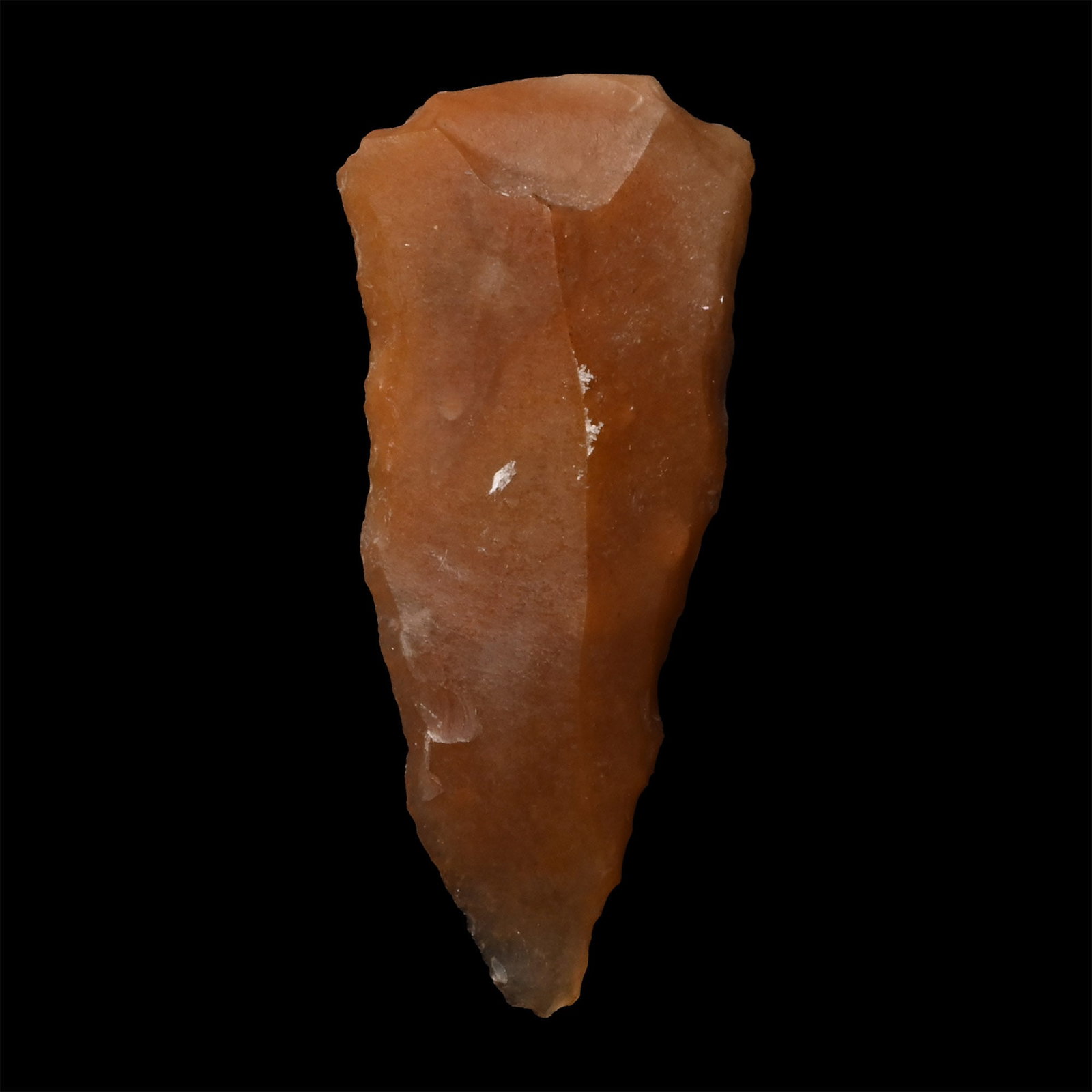 British Stone Age Knapped Flint Chisel Tip Arrowhead from Farnham: Neolithic Period, circa 6000 B.P. Triangular in section with elongated point. 1.9 grams, 31.5 mm (1 1/4 in.). [No Reserve] Found in 1901. From the collection of Captain Streatfield who helped to fund 