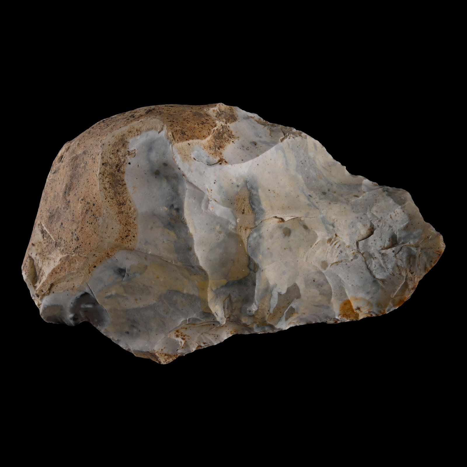 Stone Age Knapped Bifacial Flint Handaxe with Blue-White Patina: Middle Palaeolithic Period, circa 240,000-38,000 B.P. Knapped from a flint cobble, with cortex remaining at base forming a comfortable grip; some chipping to tip, either damage or usage wear, or both.