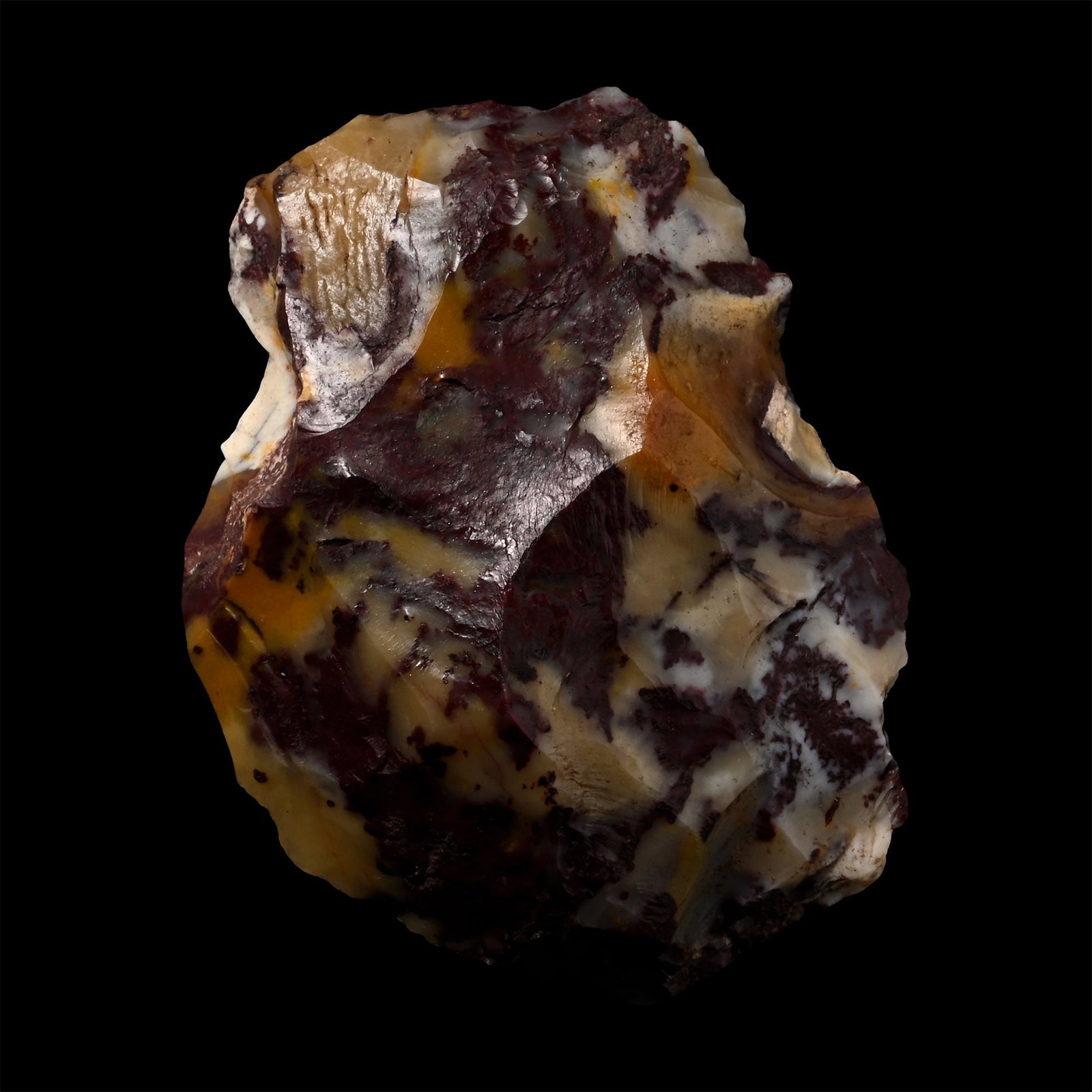 Stone Age Mousterian Knapped Fontmaure Jasper Neanderthal Tortoise-Back Knife: Middle Palaeolithic Period, circa 150,000-60,000 B.P. Cordate in profile and lentoid in section with a broad cutting edge. 70.70 grams, 68.22 mm (2 1/2 in.). [No Reserve] Fontmaure, Vienne department,