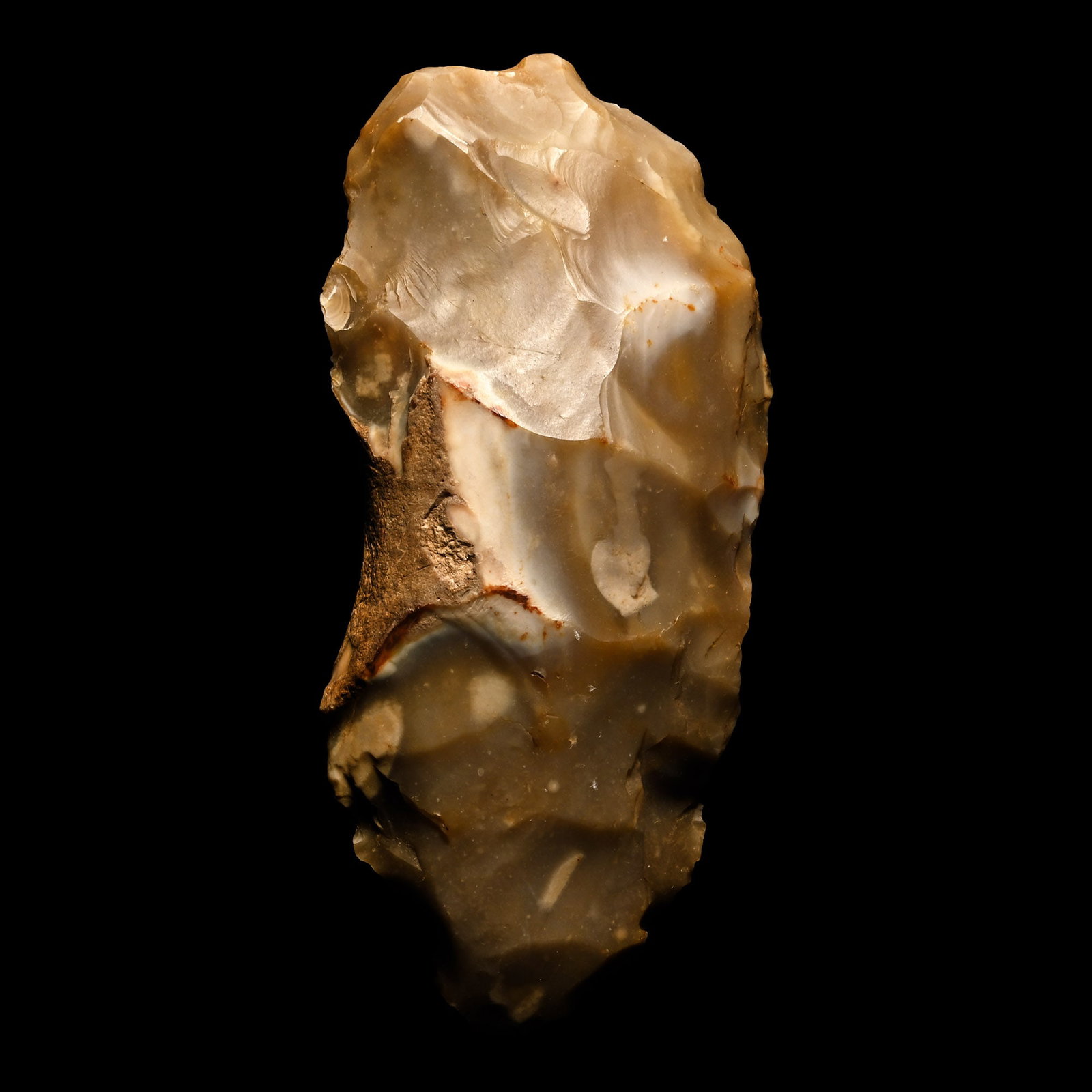 French Stone Age Knapped Cream Flint Adze: Mesolithic Period, circa 12,000-8,000 B.P. Leaf-shaped with a waisted section of cortex forming a thumb-pad. 259 grams, 13.2 cm (5 1/8 in.). [No Reserve] Acquired in the 1970s-1990s. From the collecti