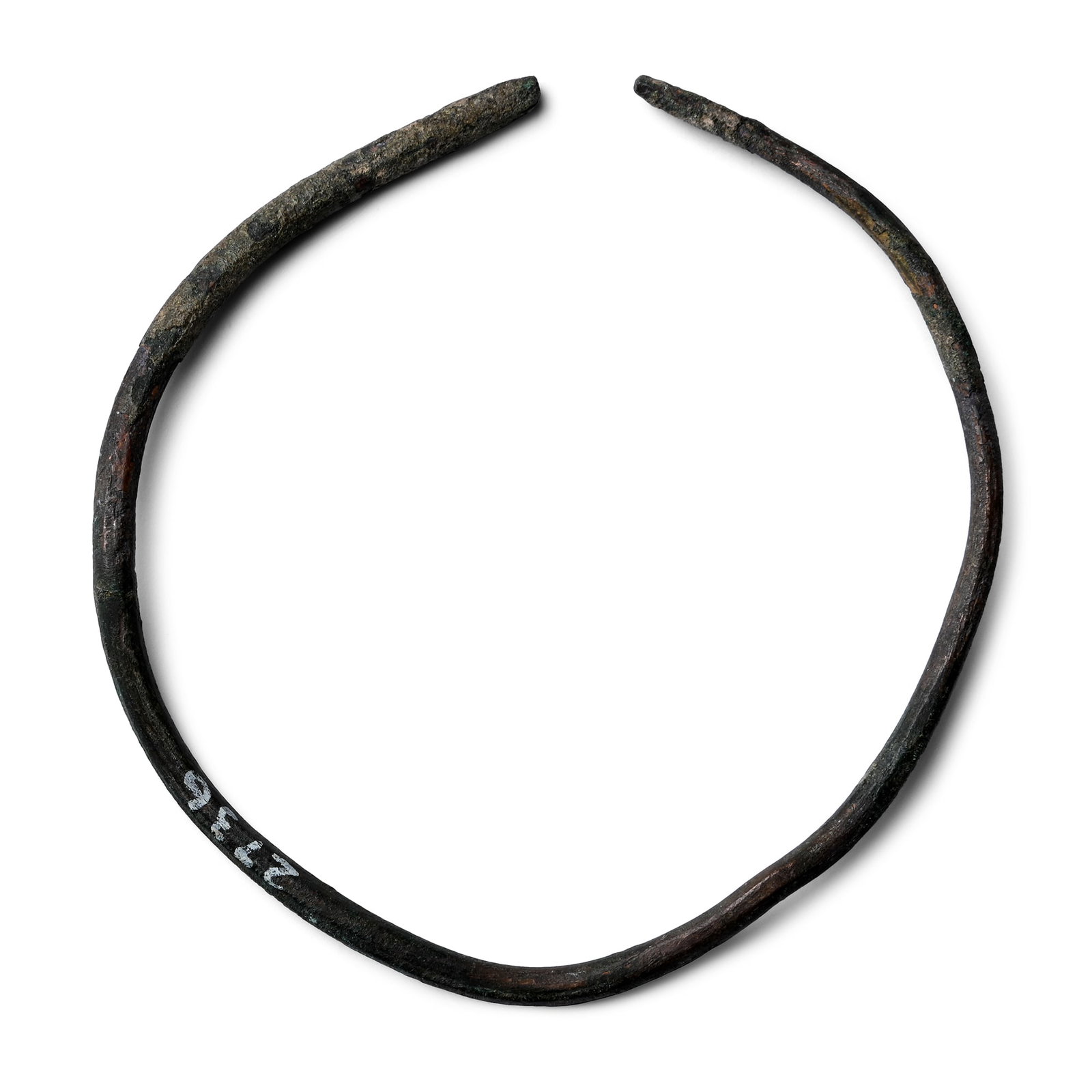 Large Bronze Age Bar Bracelet: 1st millennium B.C. The penannular body formed from a round-section bar; inked collection number '2736' to one side. 18.7 grams, 85 mm (3 3/8 in.). [No Reserve] From the private collection of a Europe