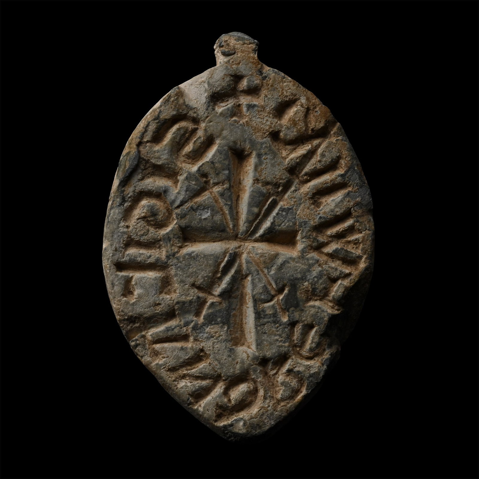 Large Medieval Lead Seal Matrix for Andrew, son of William: 14th-15th century A.D. Lentoid in plan with spur to the apex; obverse with cross and four swords, legend to border in Lombardic script '+ SIGIL’ ANDRE .F’ WILL’ (seal of Andrew [son of] Will[iam