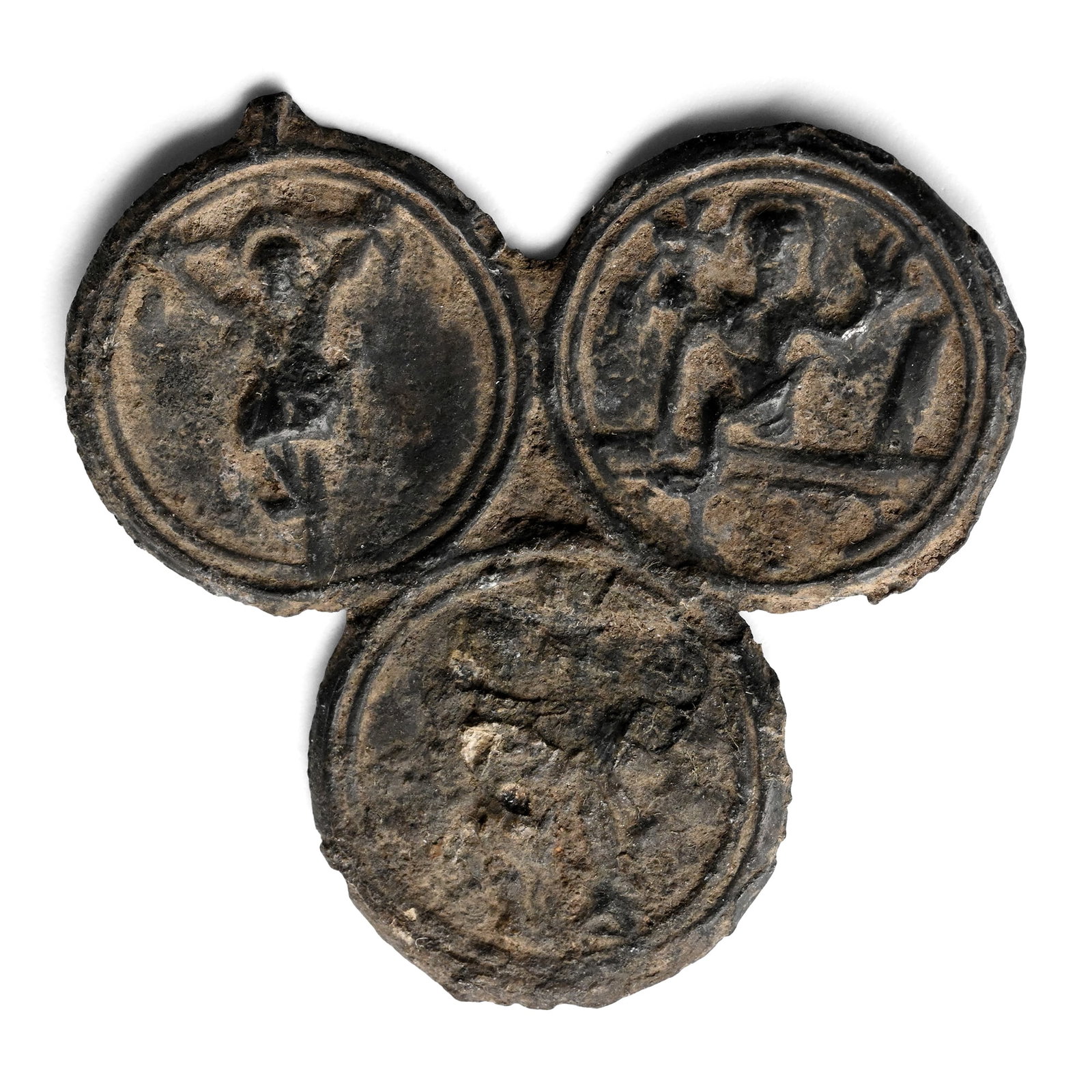 Medieval Pewter Pilgrim's Badge of the Holy Blood of Wilsnack: 14th-15th century A.D. Trefoil in plan with raised rim to each lobe, spur of sprue to one edge; low-relief images of the three hosts of Wilsnack. Cf. van Beuningen, H.J.E. & Koldeweij, A.M., Rotterdam
